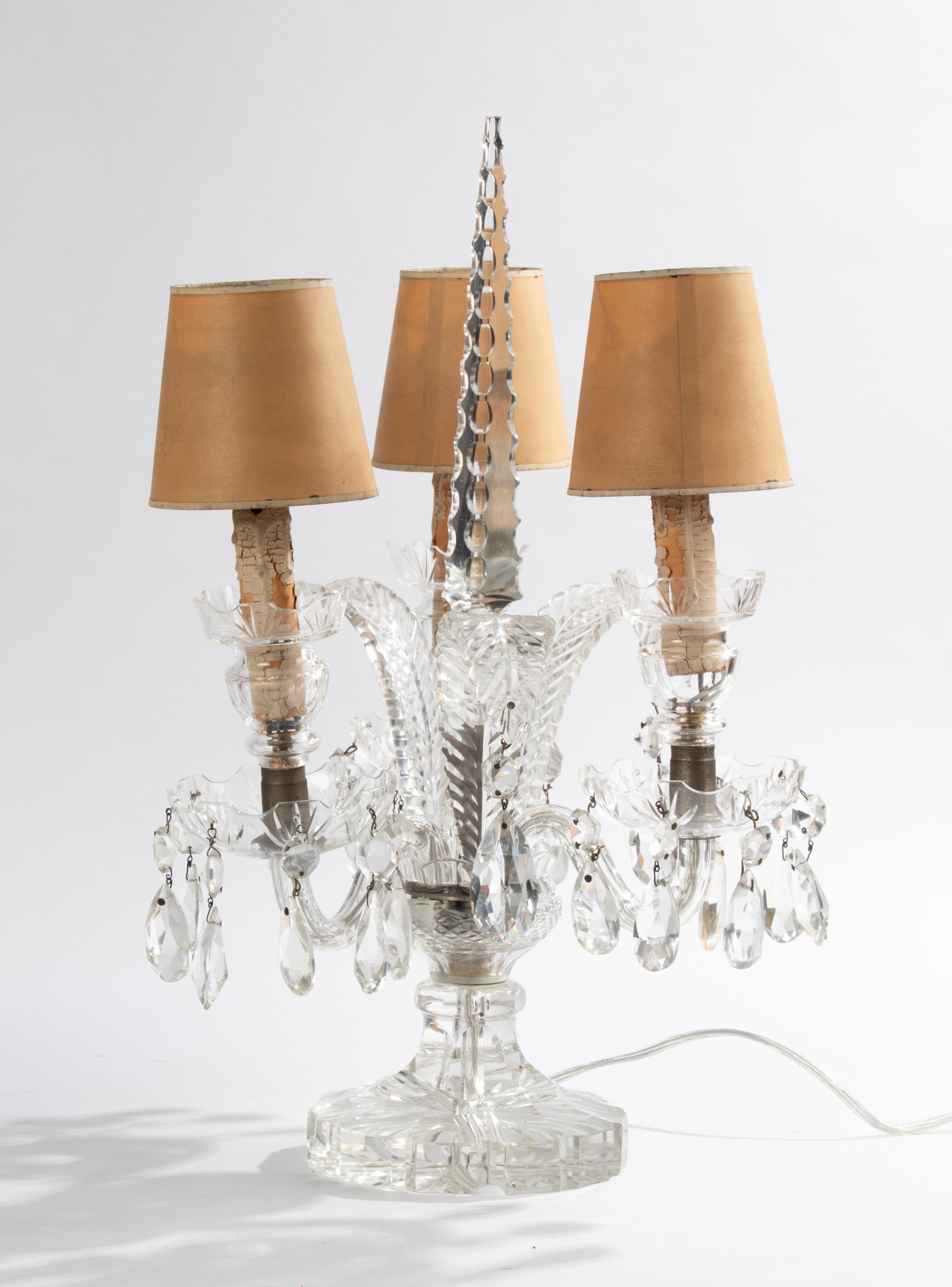 A beautiful set of 2 crystal table lamps, so called 'girandolles'. 
Very decorative shapes. With original lamp shades and paper candle holders.
Rewired, with switch and EU plug

Dimensions: 50 (h) x 30 x 30 cm
Free shipping worldwide