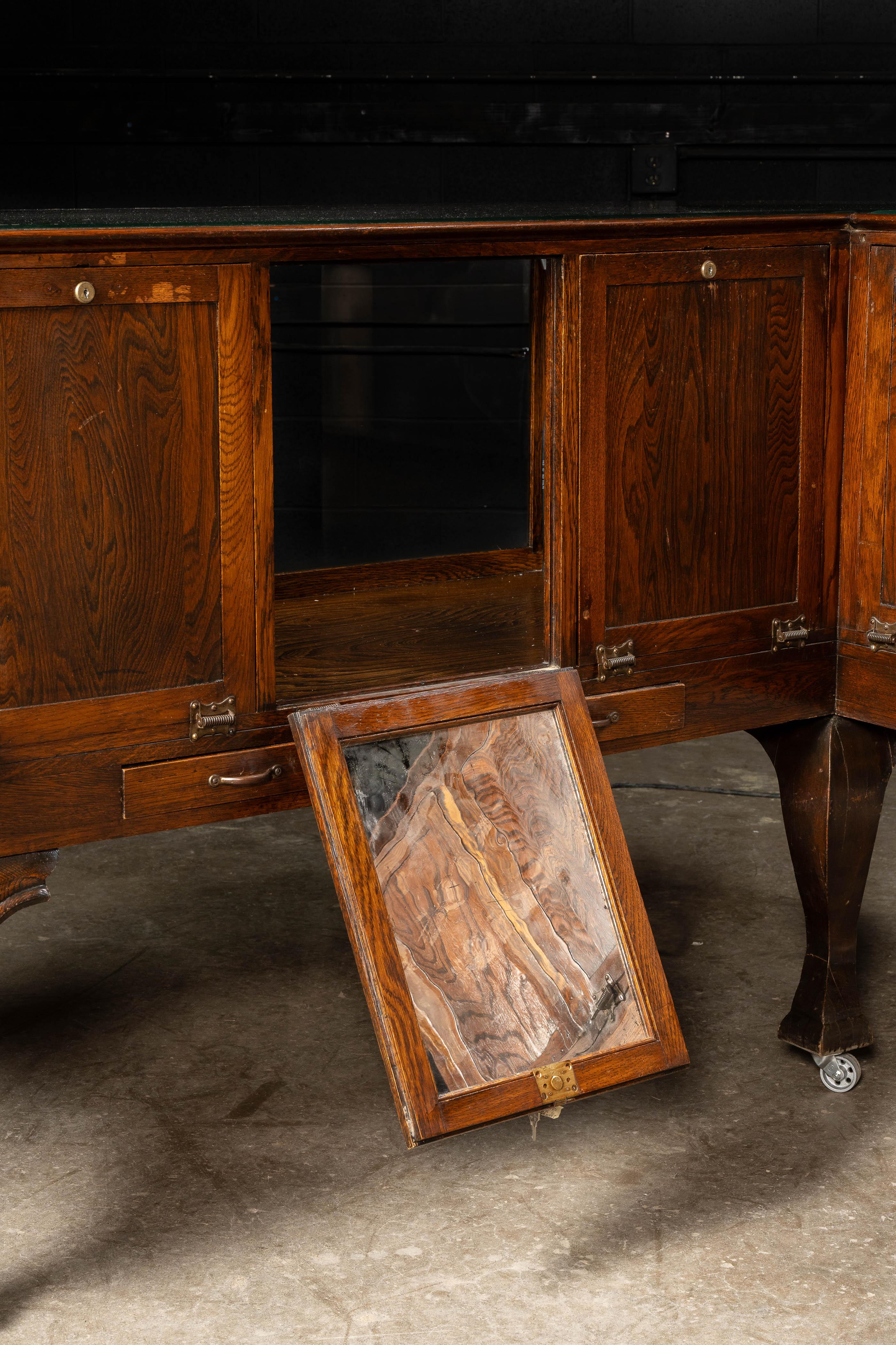 Early 20th Century Curved Glass Lighted Corner Display Case For Sale 11