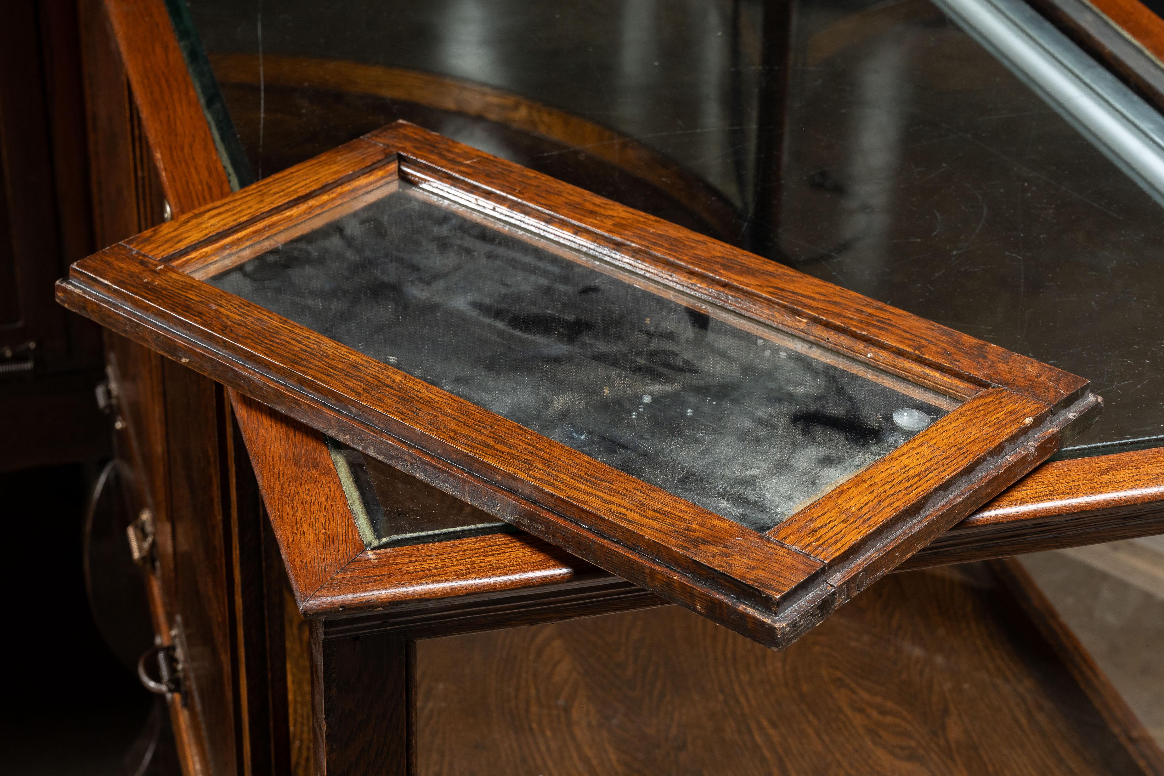 Early 20th Century Curved Glass Lighted Corner Display Case For Sale 15