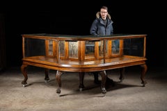 Early 20th Century Curved Glass Lighted Corner Display Case