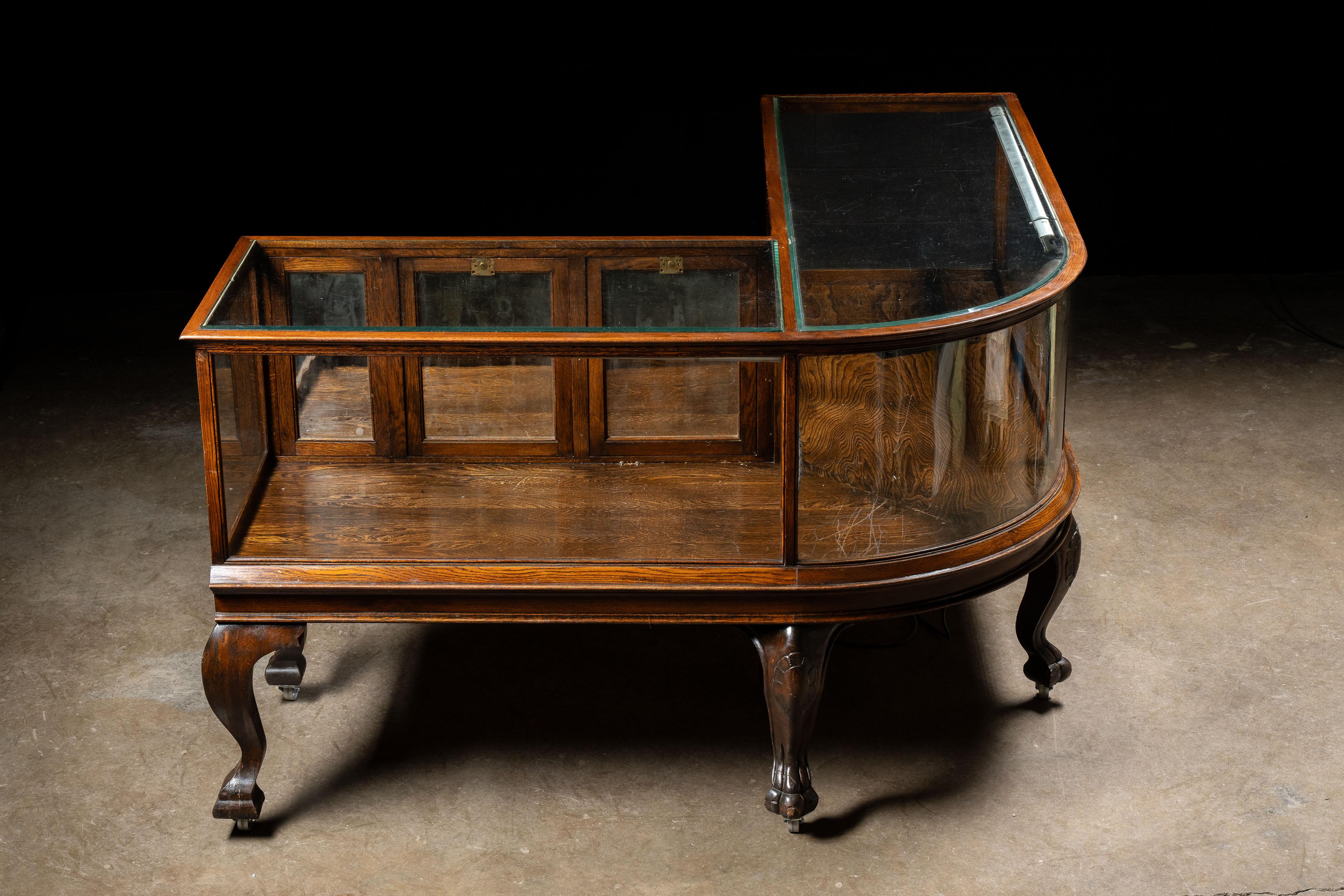 Early 20th Century Curved Glass Lighted Corner Display Case For Sale 1