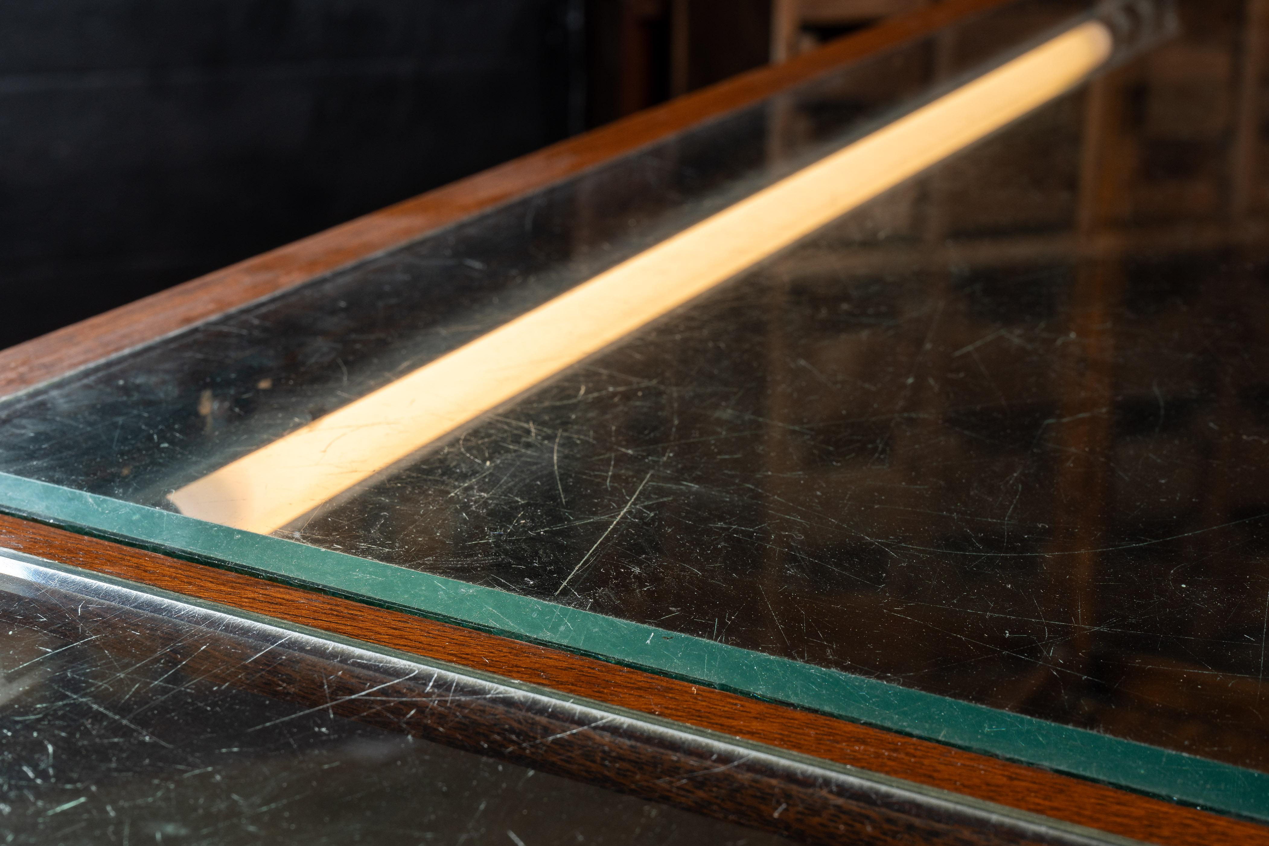 Early 20th Century Curved Glass Lighted Corner Display Case For Sale 6