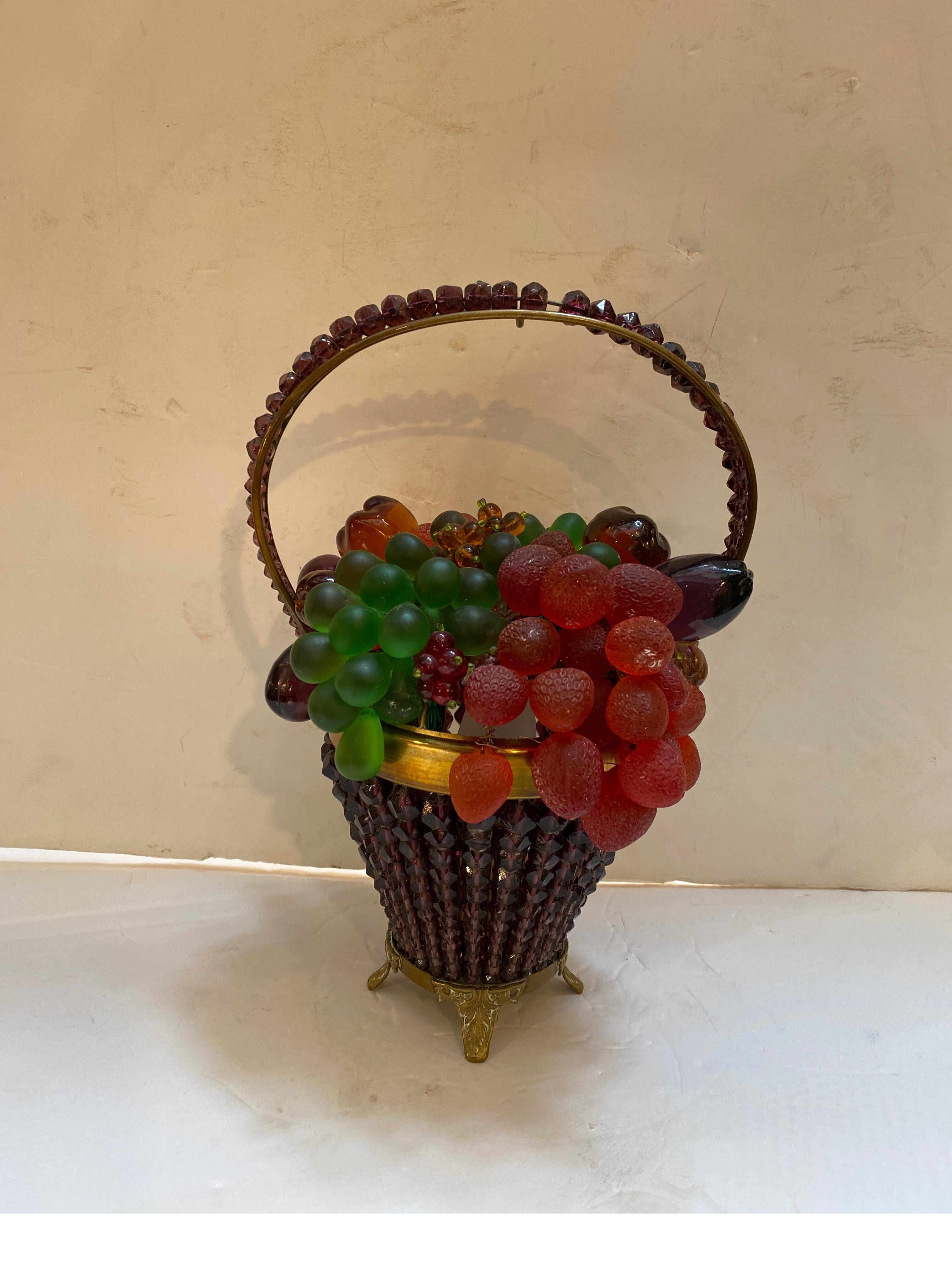 Whimsical 1920's Czech glass beaded fruit basket form lamp. The beaded handle with fruit shaped beads forming the filling of the basket. The metal shape of the handle and basket made of brass with the hand applied glass beads attached and arranged
