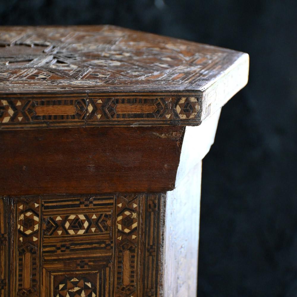Early 20th century Damascus Inlayed Tall Table 
A true example of an early 20th century Damascus tall side table, inlaid with hand carved wooden geometric design panels of wood. The tall and slim shape is highly decorative even with its top sections