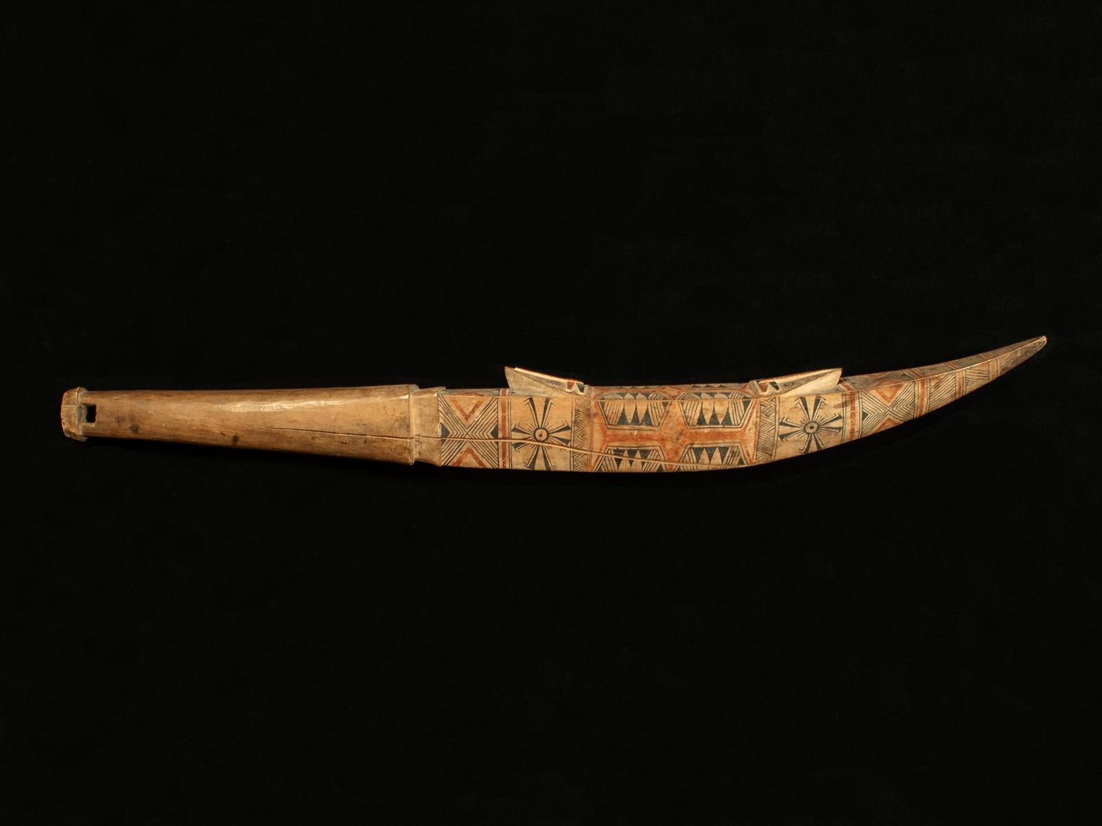 Napa dance wand, Nendo people, Temotu Province, Santa Cruz Islands, Solomon Islands

An unusually large napa dance wand in the form of a highly stylized canoe, tapering to a point at one end. Two raised ancestor heads are incorporated into the