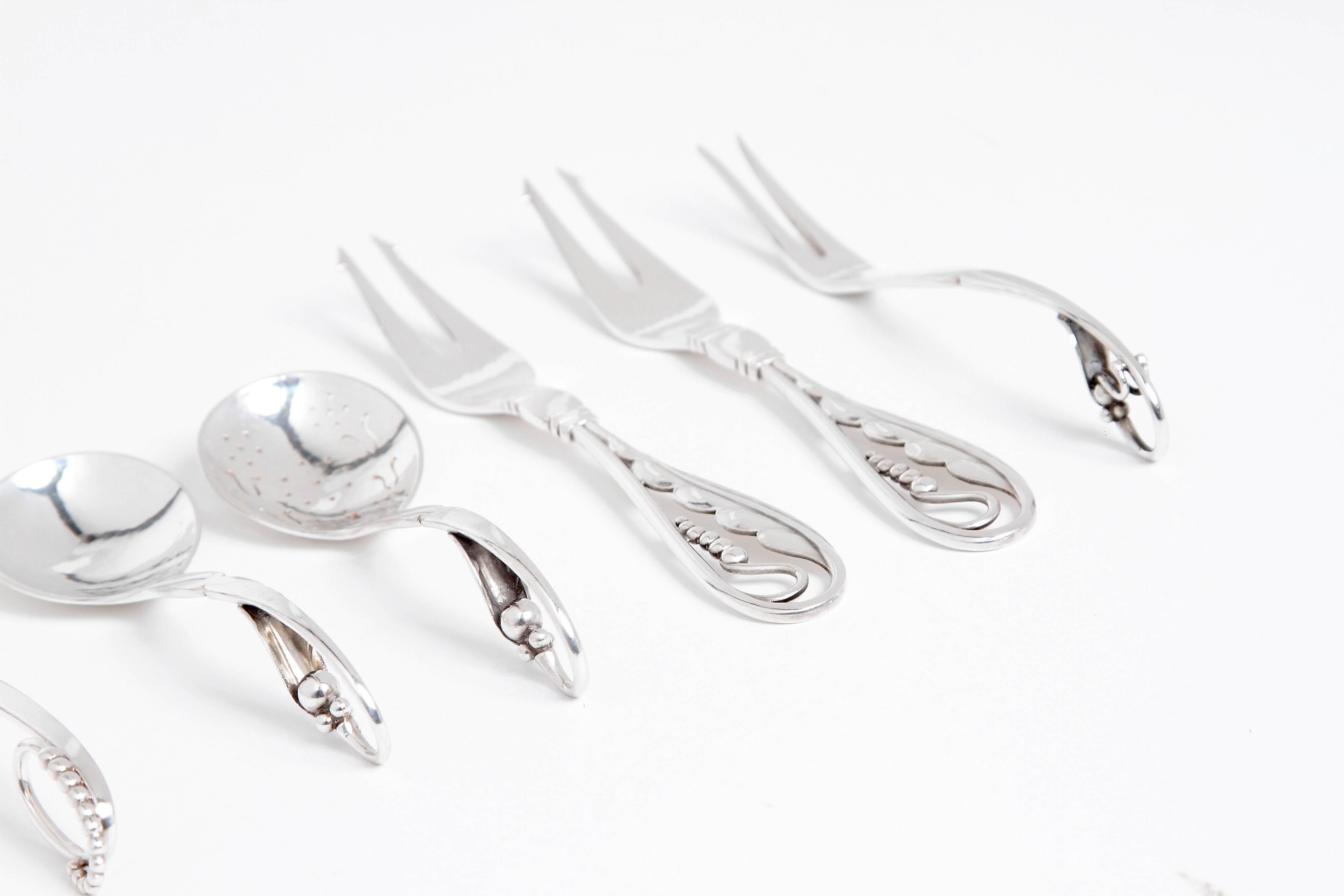 Early 20th Century Danish Sterling Spoons and Forks by Georg Jensen Silversmith In Good Condition In Dallas, TX