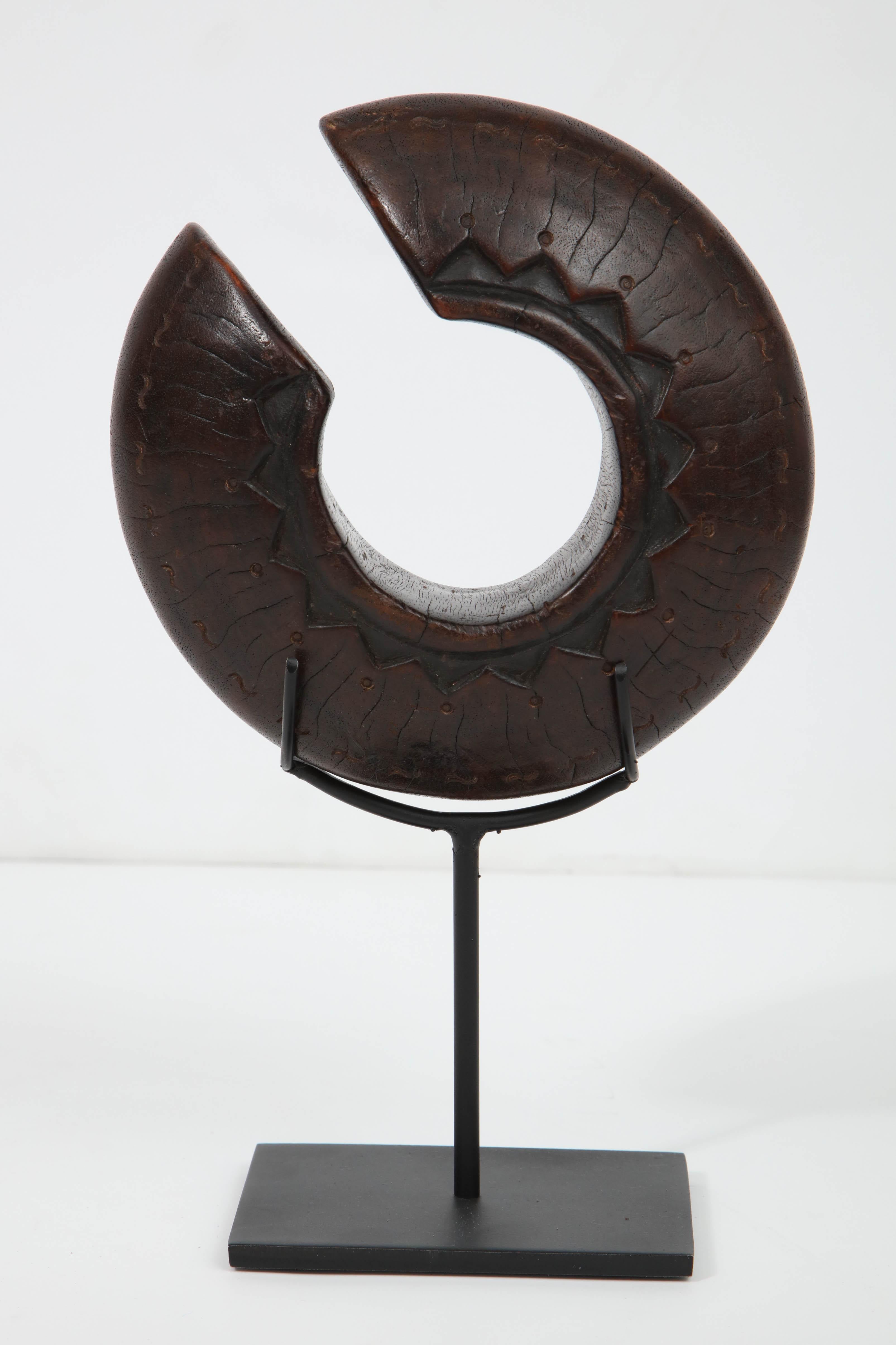 Early 20th Century Danka Wood Bracelet on Later Iron Stand In Excellent Condition For Sale In New York, NY