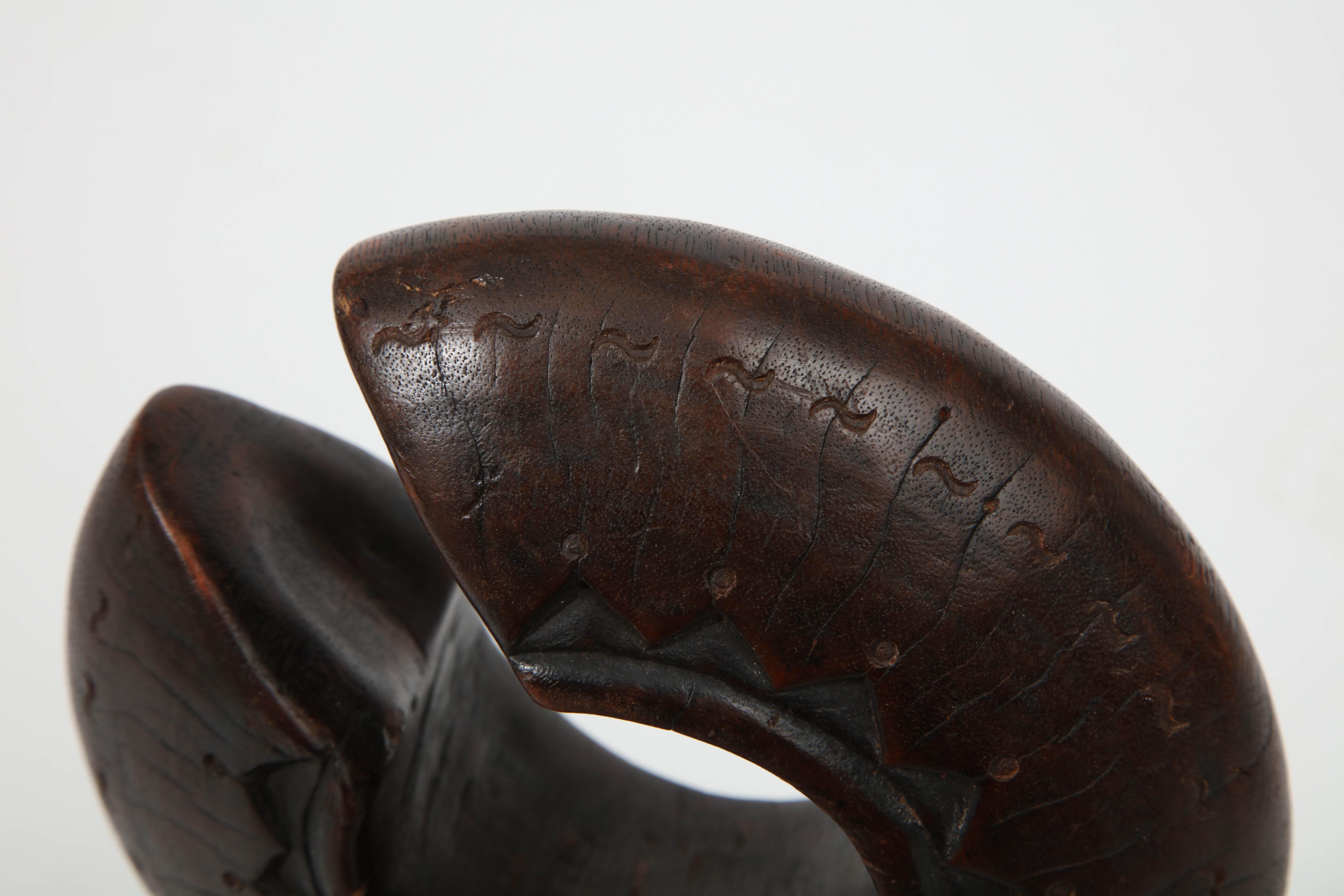 Early 20th Century Danka Wood Bracelet on Later Iron Stand For Sale 4