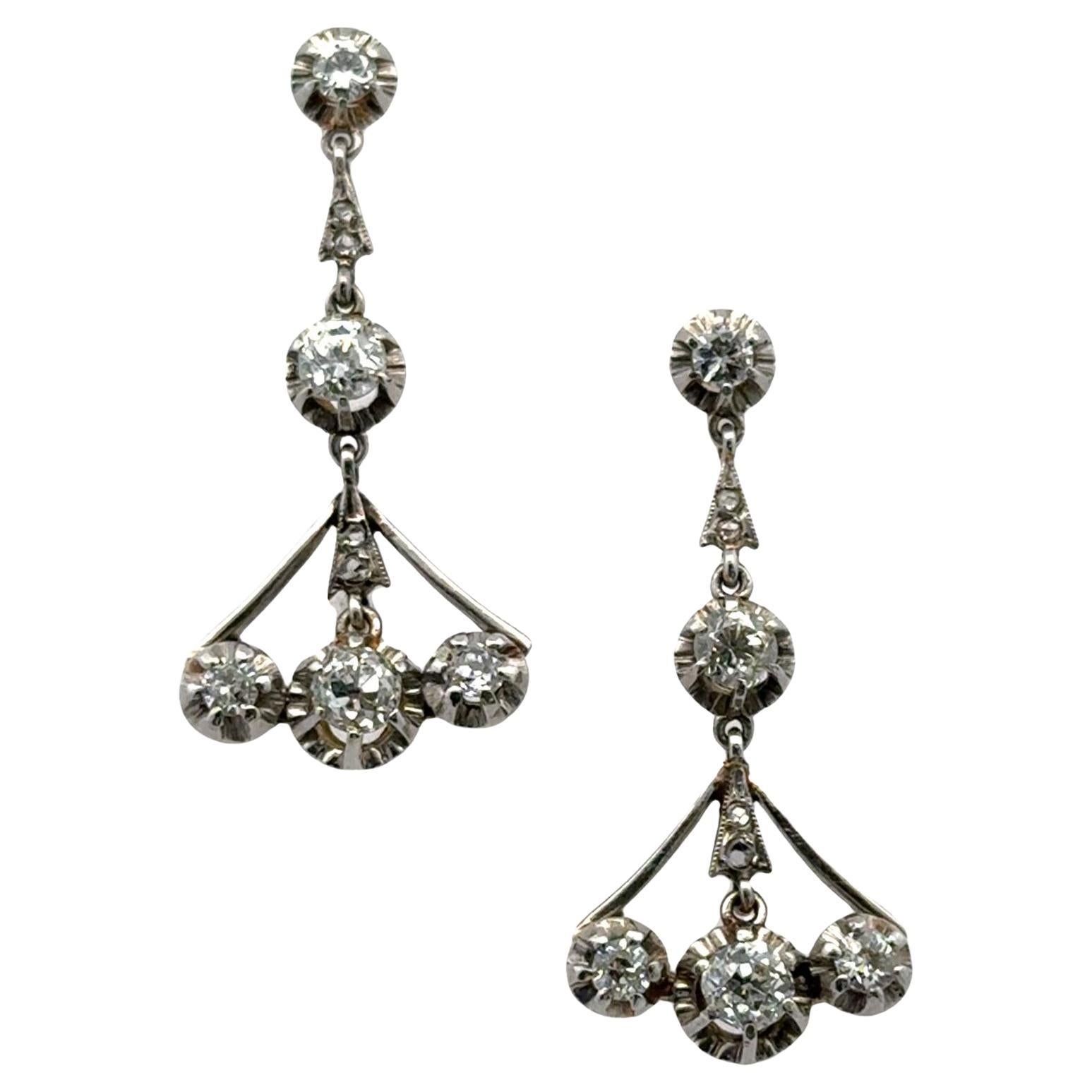 Orecchini vintage a goccia con diamante in platino e oro giallo dei primi del Novecento