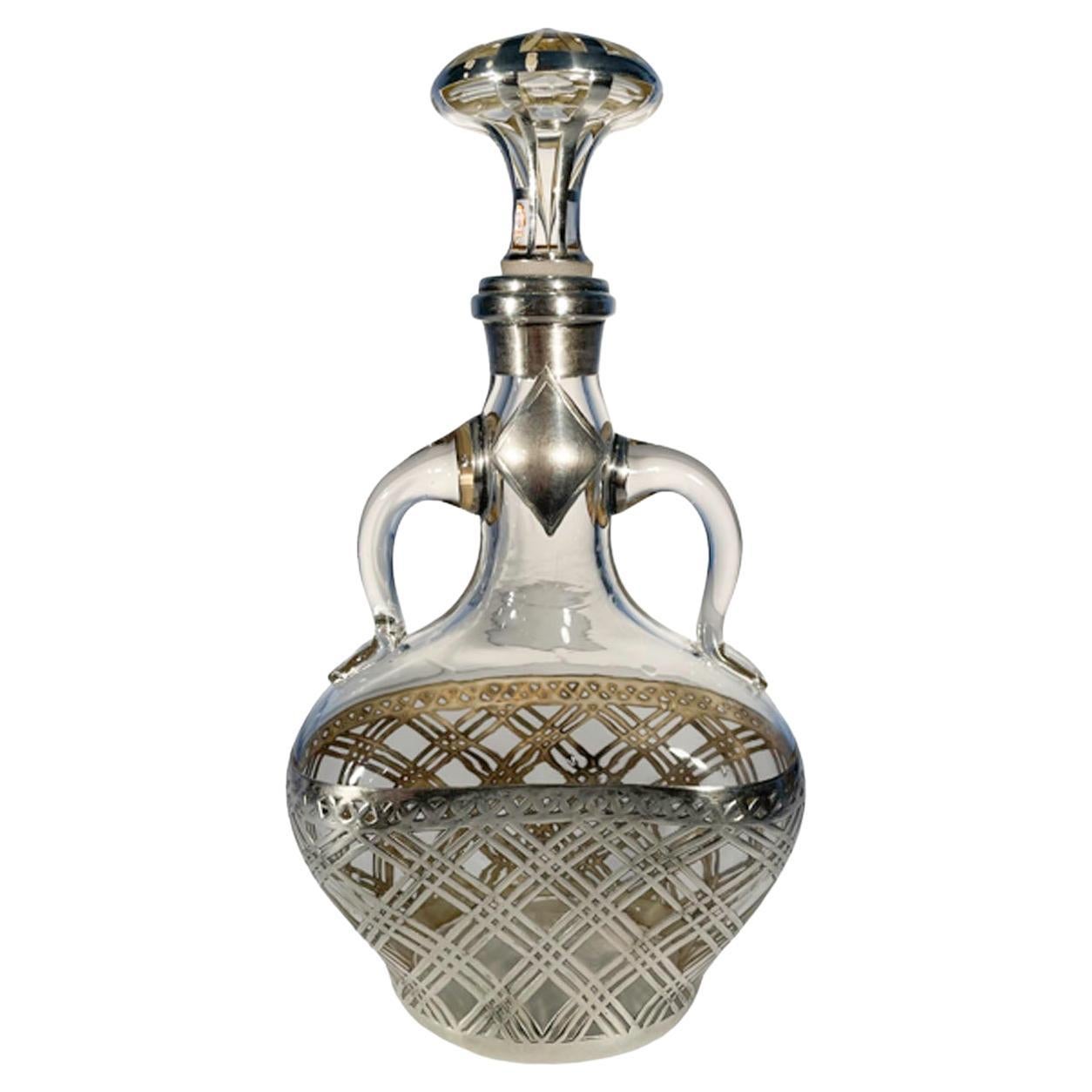 Early 20th Century Double Handled Silver Overlaid Clear Glass Decanter For Sale