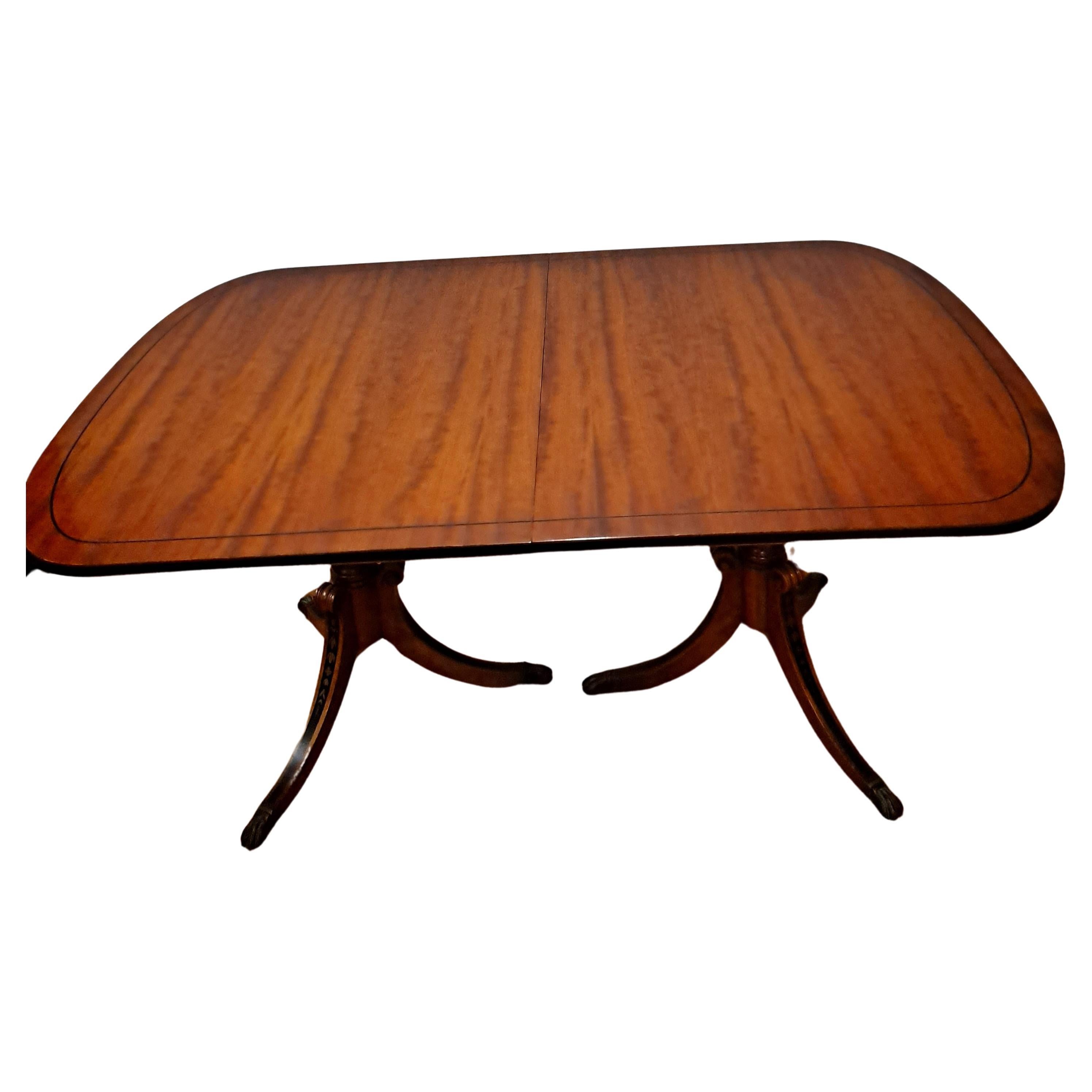 Early 20th Century Double Pedestal Mahogany Table with Extension Leaf For Sale