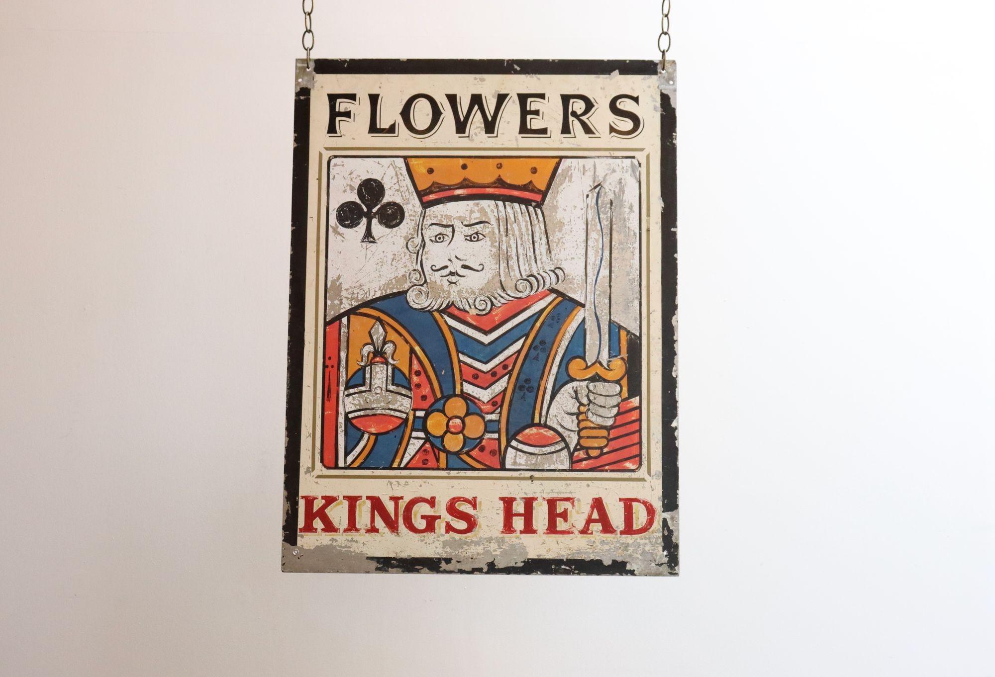 English two-sided handmade and painted metal pub sign depicting a king of clubs with the text 