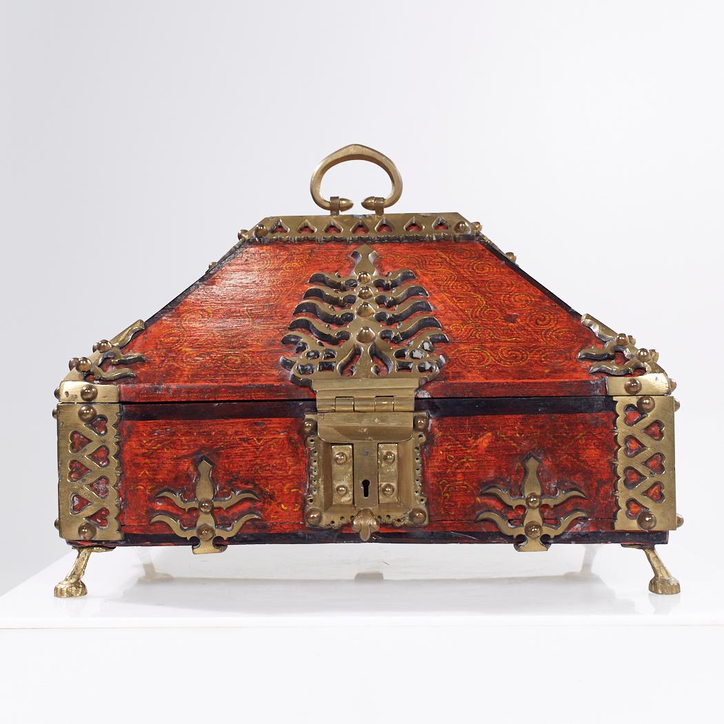 Early 20th Century Dowry Chest Malabar Box from Kerala India

This chest measures: 16.75 wide x 12.5 deep x 13 inches high

We take our photos in a controlled lighting studio to show as much detail as possible. We do not Photoshop out
