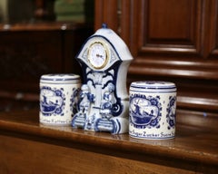 Early 20th Century Dutch and German Three-Piece Delft Canisters and Clock