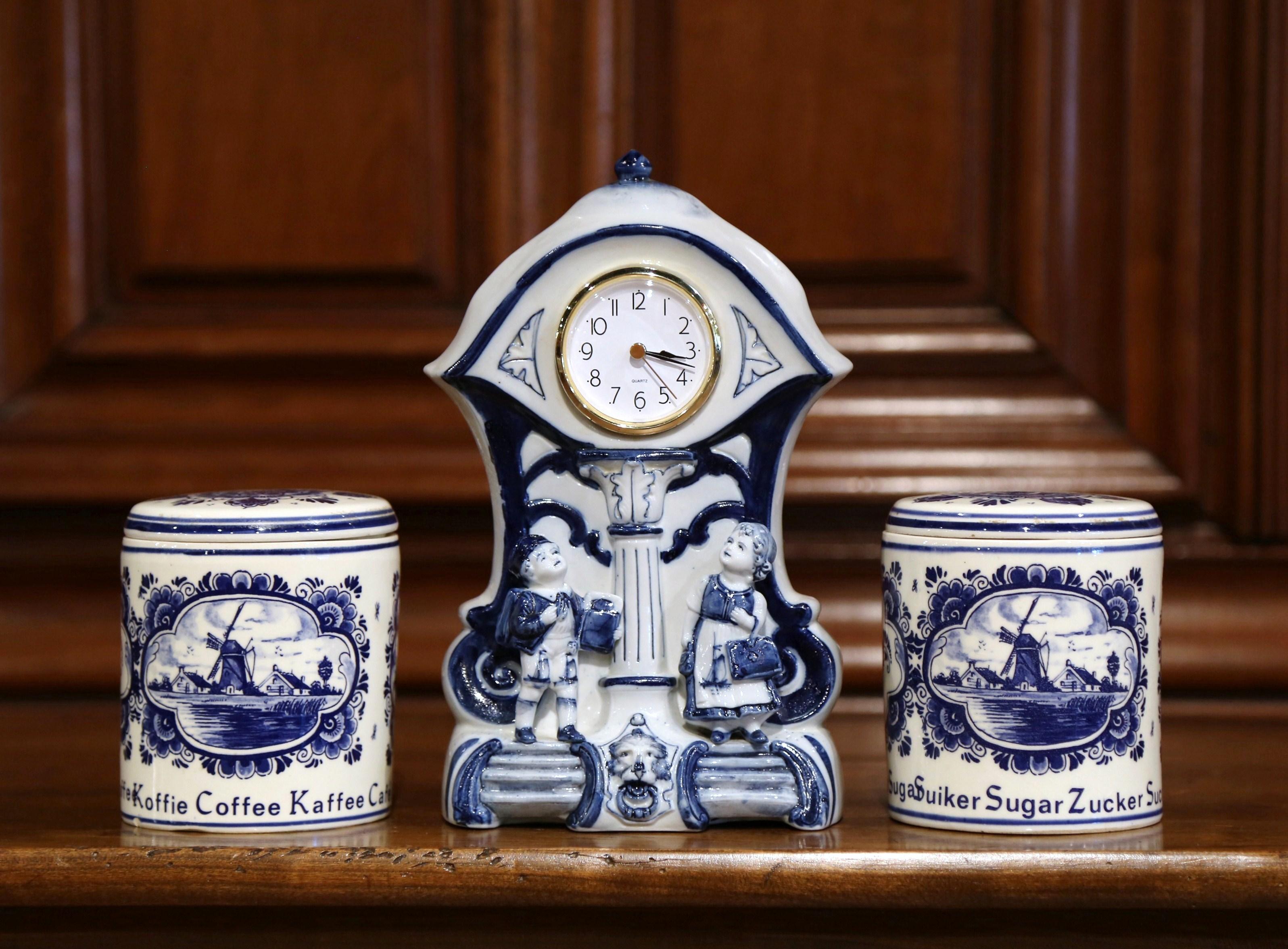 Early 20th Century Dutch and German Three-Piece Delft Canisters and Clock In Excellent Condition In Dallas, TX