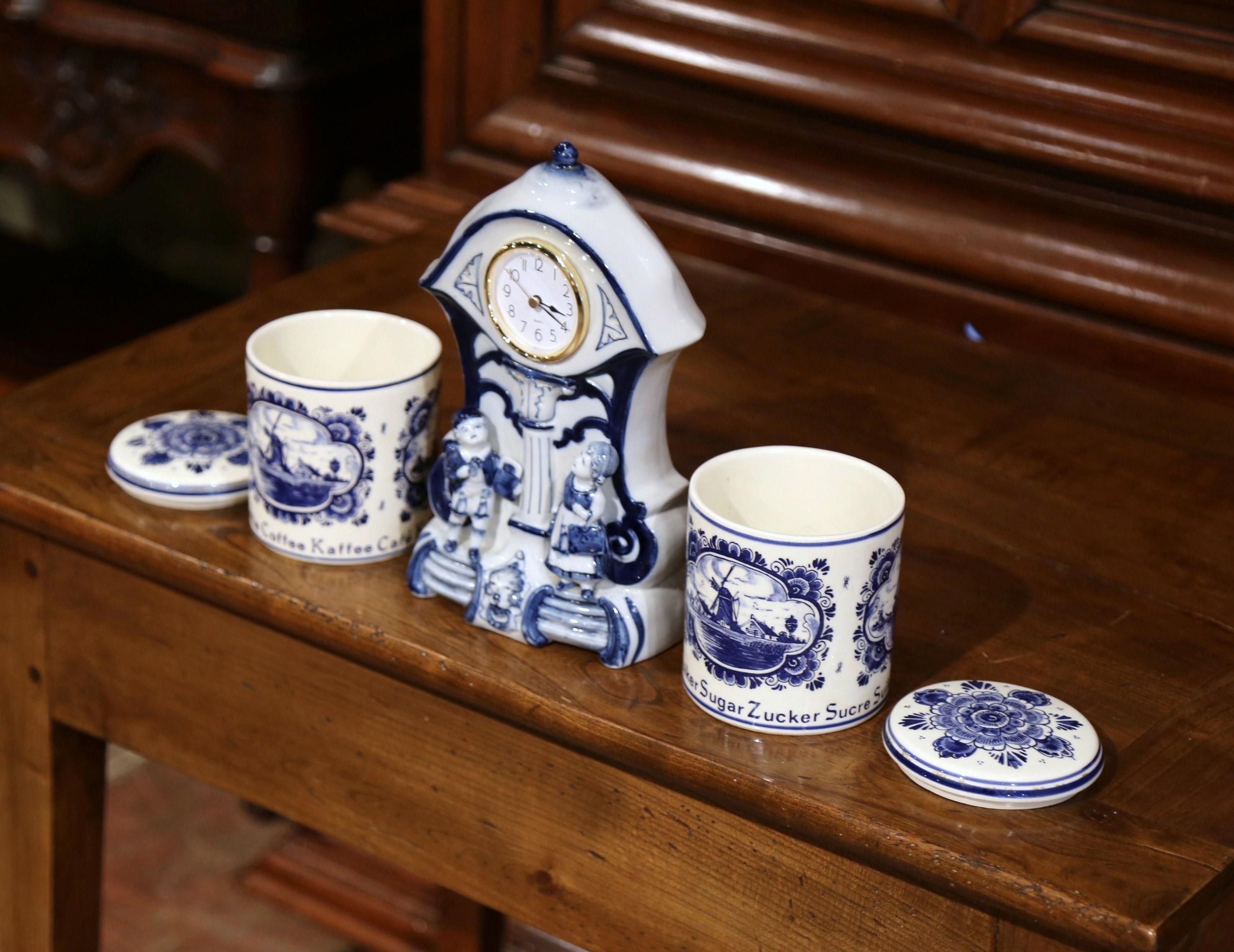 Ceramic Early 20th Century Dutch and German Three-Piece Delft Canisters and Clock