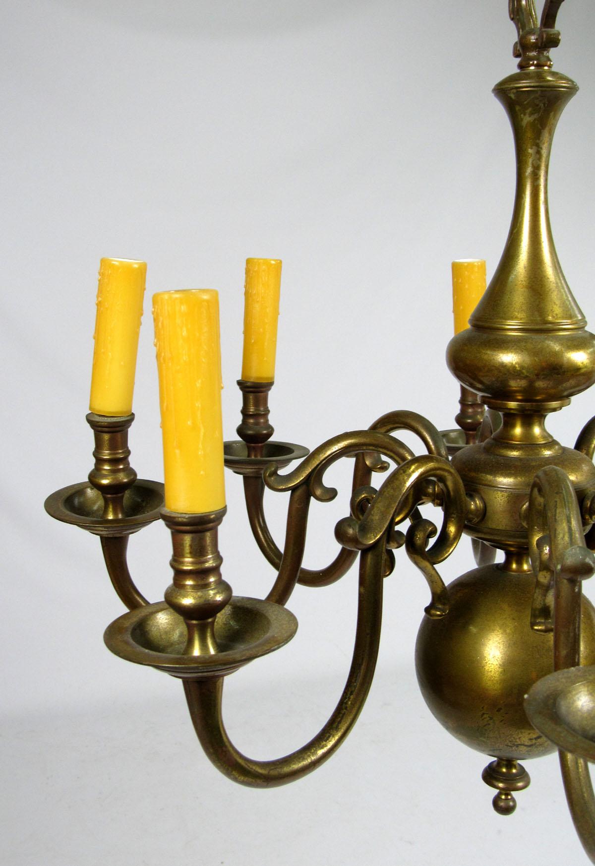 Early 20th century Dutch brass chandelier with eight lights.
