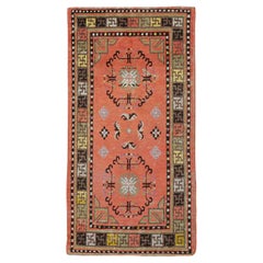 Alfombra Khotan del Turquestán Oriental de principios del siglo XX