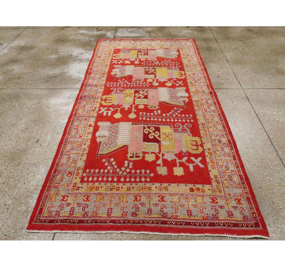 Hand-Knotted Early 20th Century East Turkestan Pictorial Vase Khotan Small Gallery Rug in Red For Sale