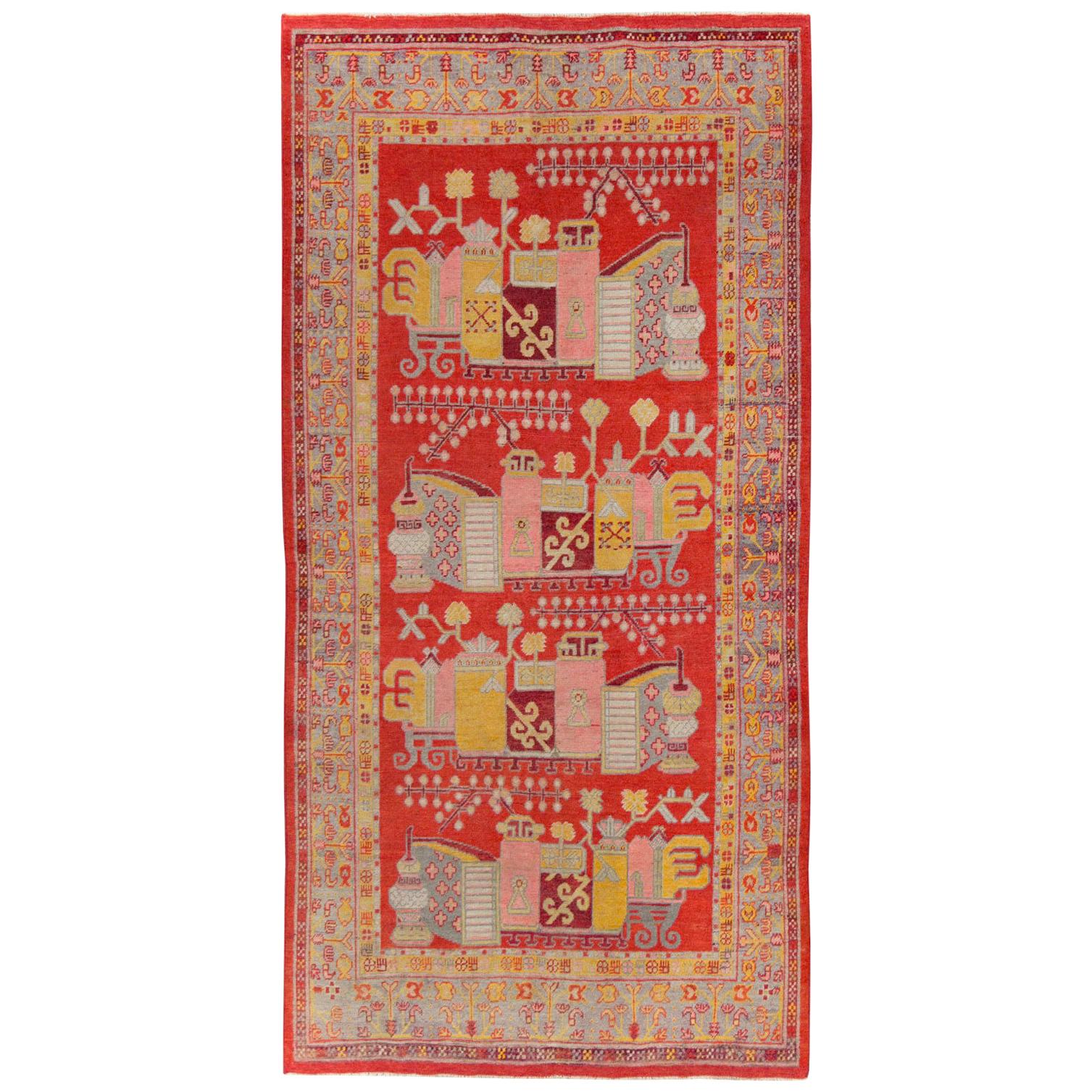 Early 20th Century East Turkestan Pictorial Vase Khotan Small Gallery Rug in Red For Sale