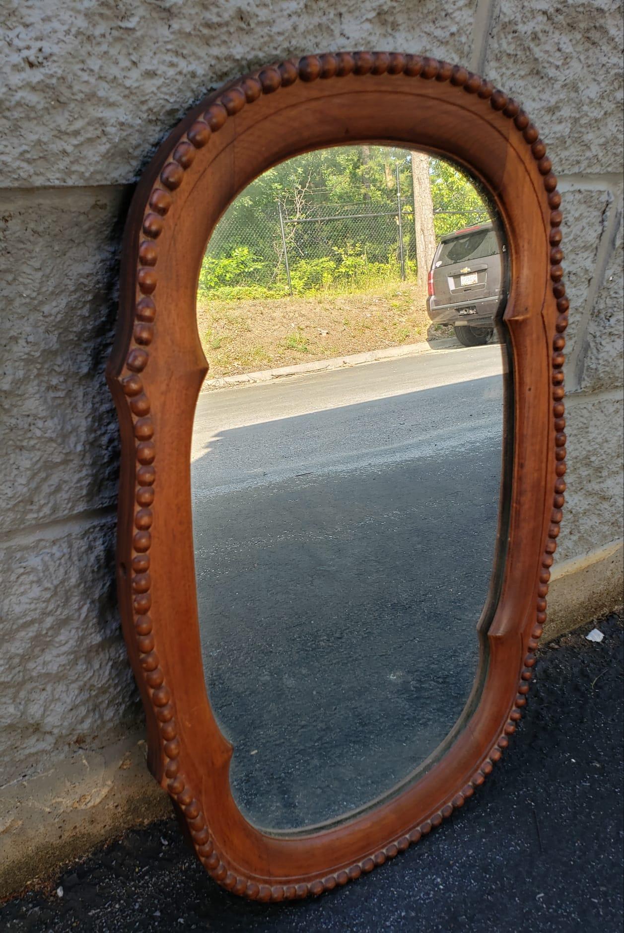 An Early 20th Century Edwardian Hand - Carved Solid Mahogany Dressing Mirror in great shape for its age.
Measures 15.5
