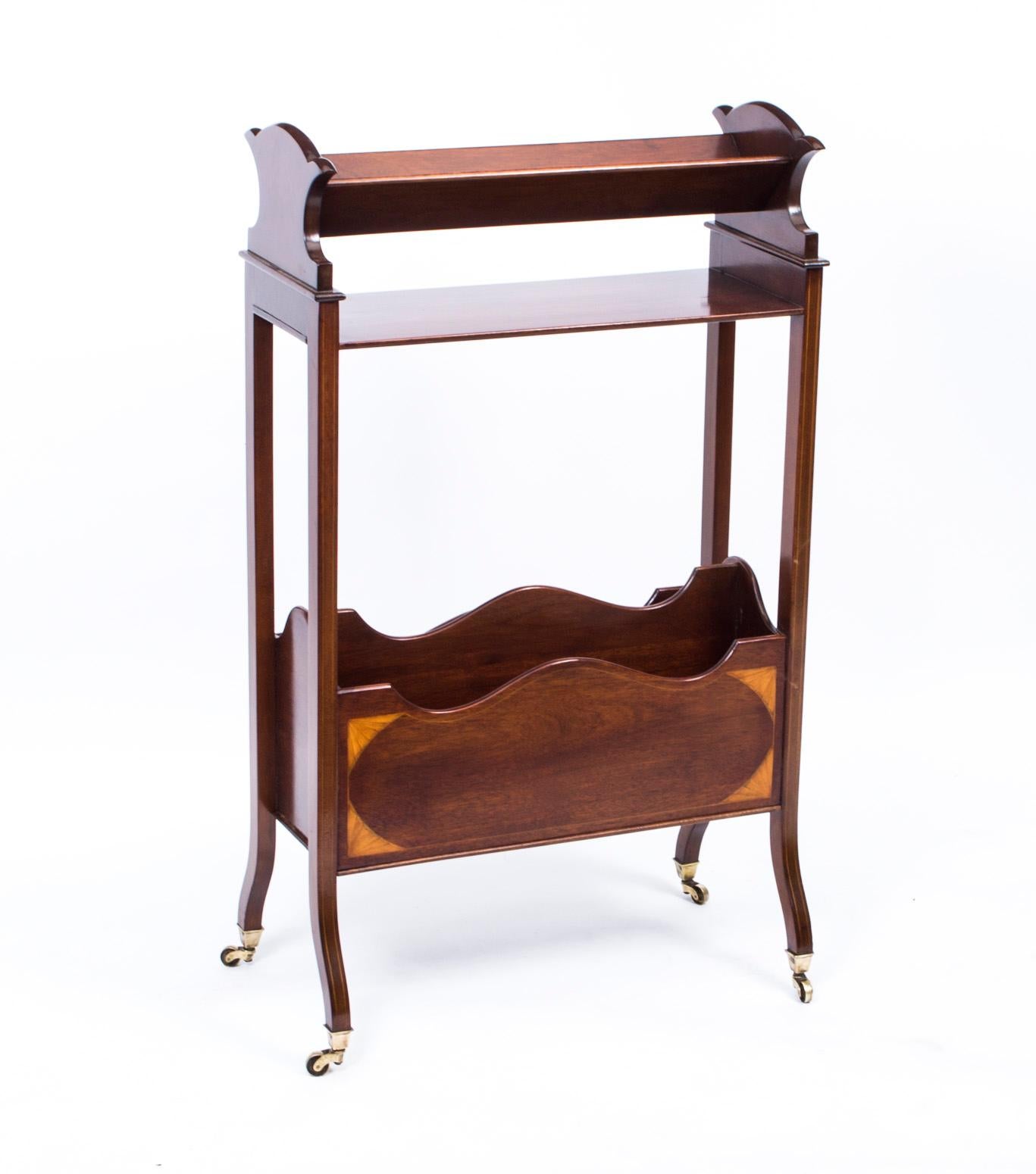 This is an elegant Edwardian bookstand, circa 1900, made from mahogany with fan inlaid decoration and boxwood stringing.

Perfect for keeping your books and magazines close to hand.

THE BOTANICAL NAME FOR THE MAHOGANY THIS ITEM IS MADE OF IS