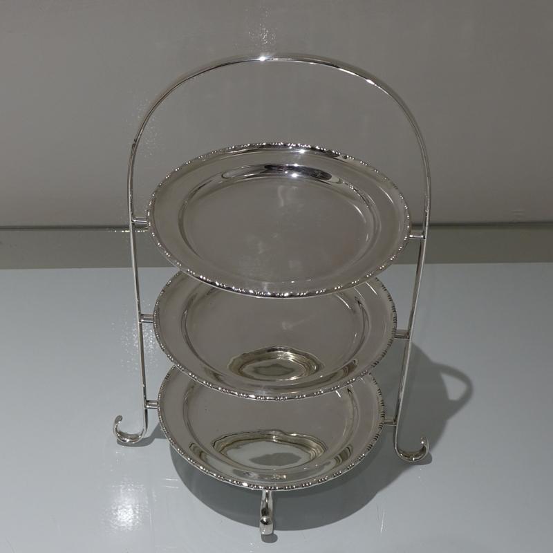 A highly desirable three tier cake stand designed with an elegant wire frame and three inner detachable plates. The plates are plain formed in design but have a stylish outer border for highlights.

 

Measures: Height 15.7 inches/40cm

Width