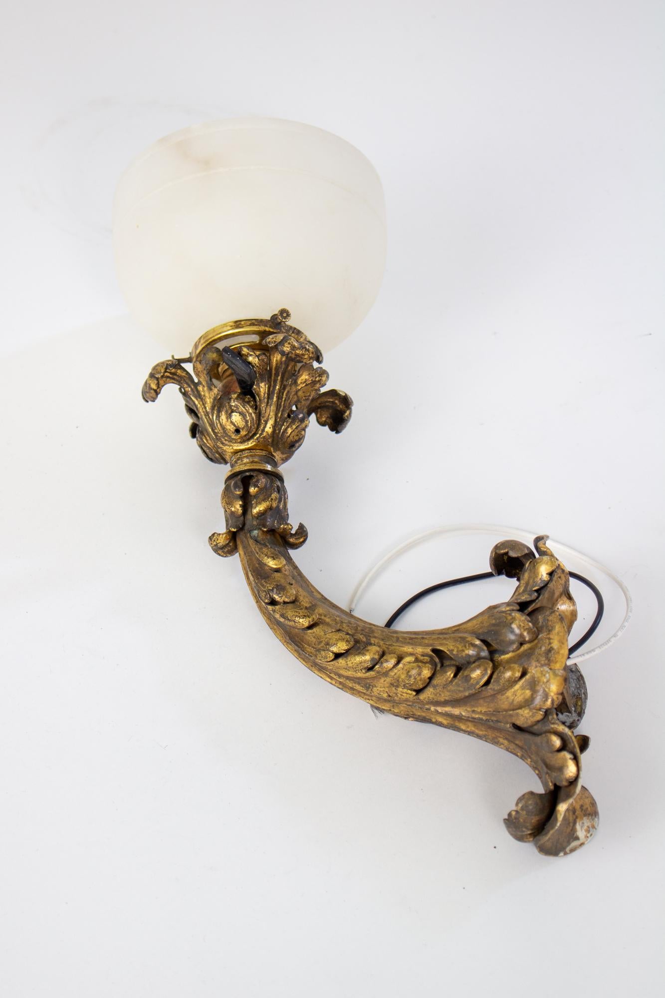 Neoclassical Revival Early 20th Century E.F.Caldwell Gilt Leafy Sconces with Alabaster Shade - a Pair For Sale