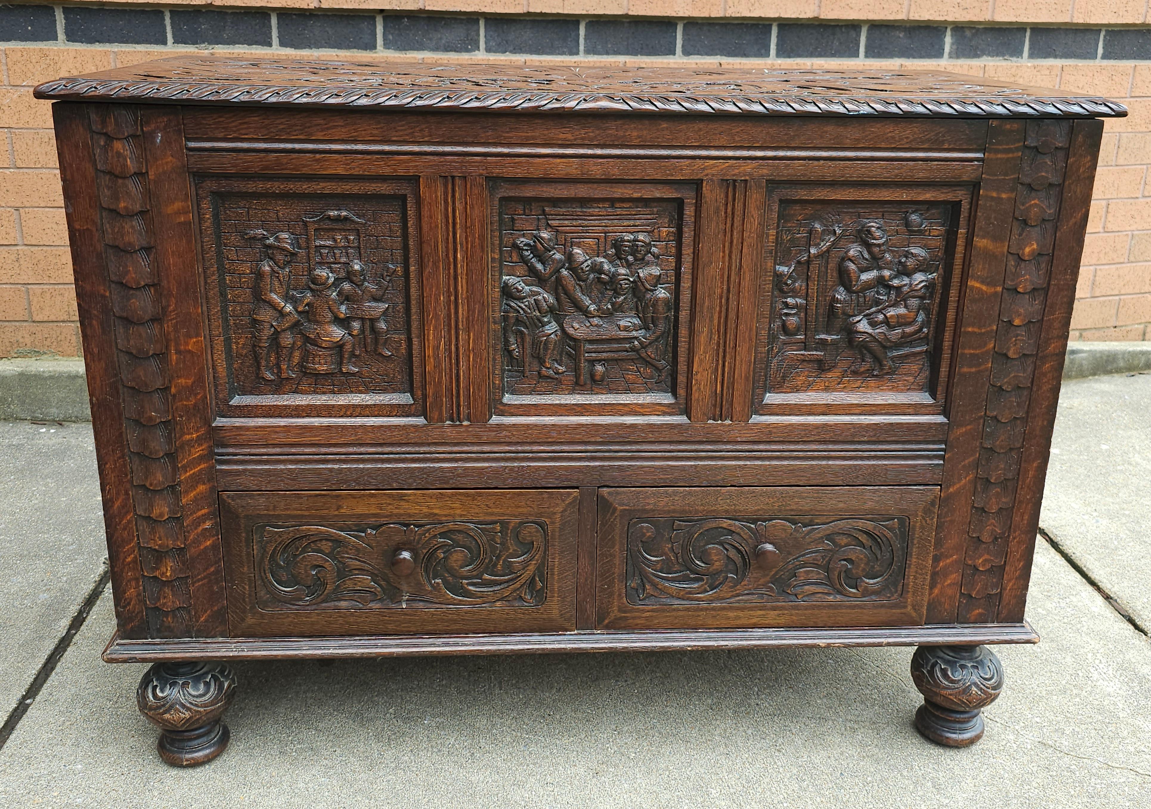 Hand-Carved Early 20th Century Elizabethan Style Hand Carved Oak Storage / Blanket Chest For Sale