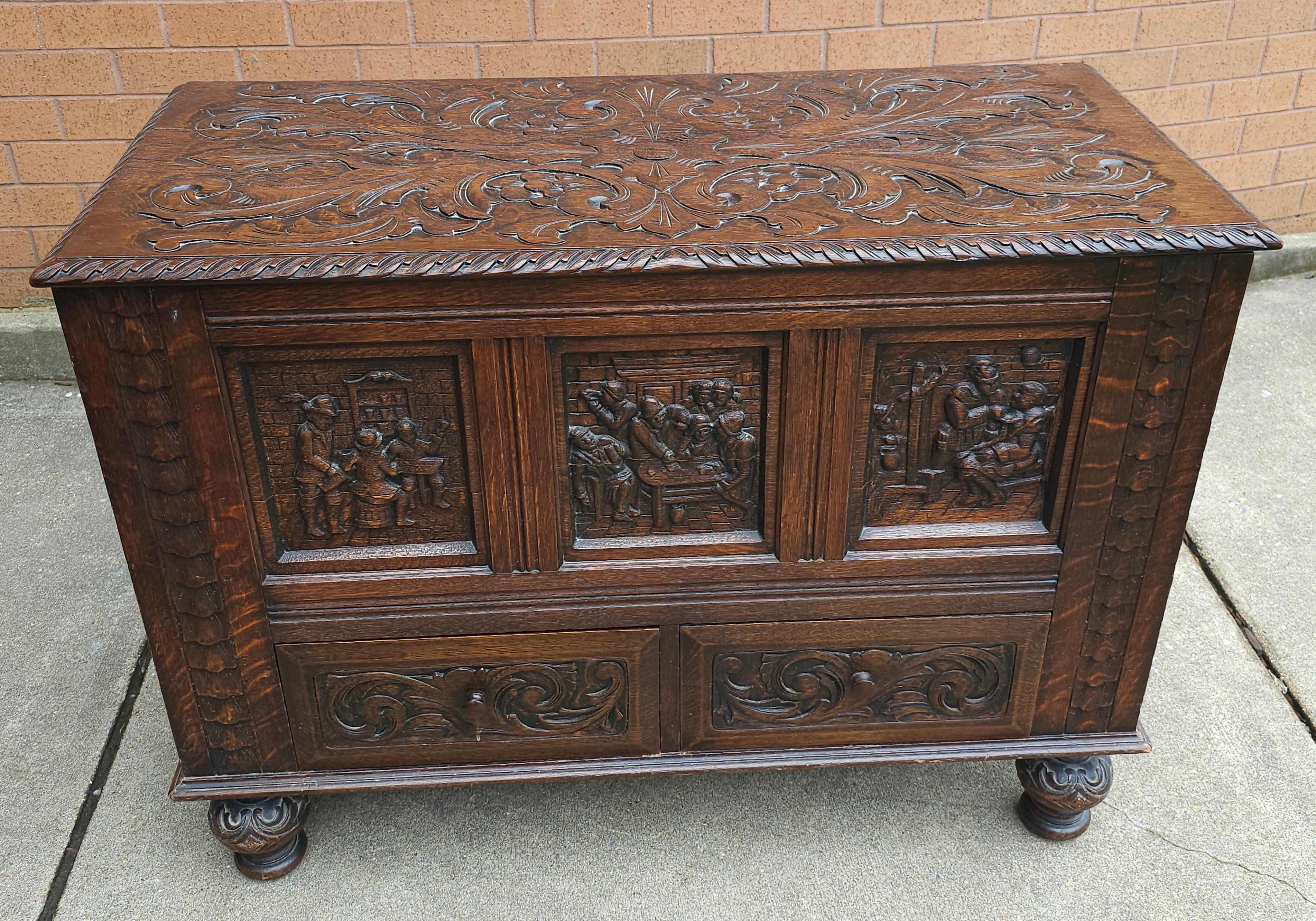 Early 20th Century Elizabethan Style Hand Carved Oak Storage / Blanket Chest In Good Condition For Sale In Germantown, MD