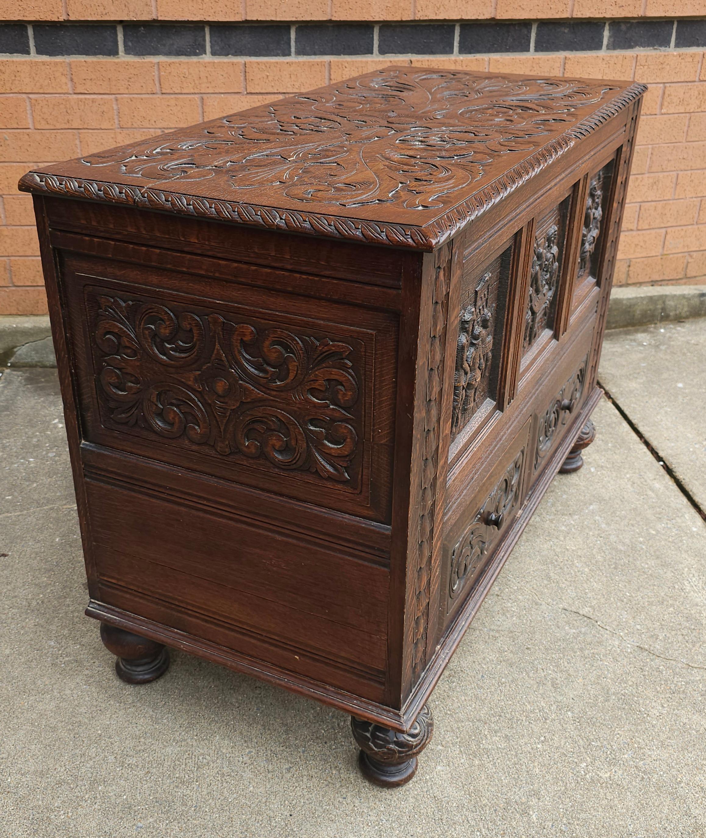 Early 20th Century Elizabethan Style Hand Carved Oak Storage / Blanket Chest For Sale 2