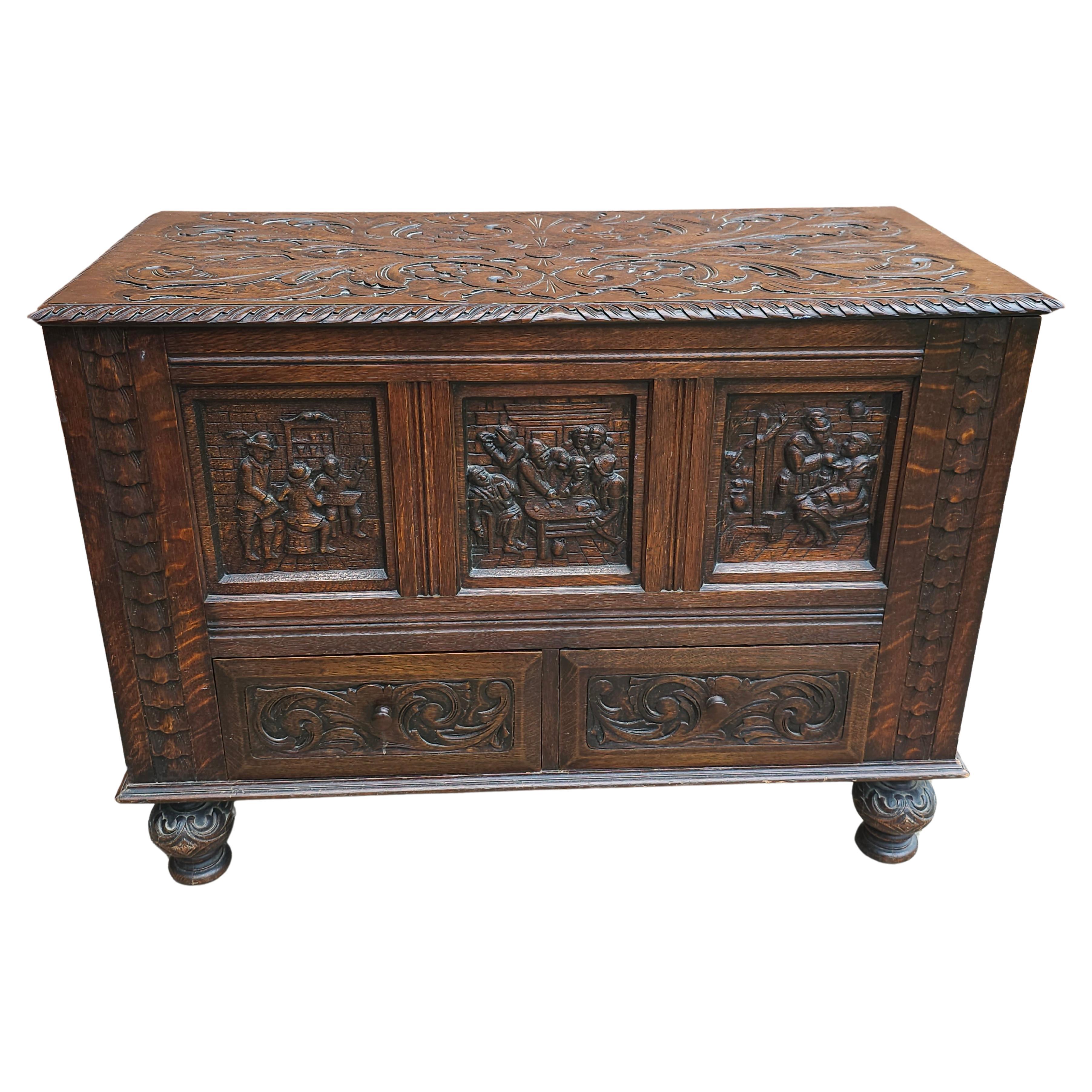Early 20th Century Elizabethan Style Hand Carved Oak Storage / Blanket Chest For Sale