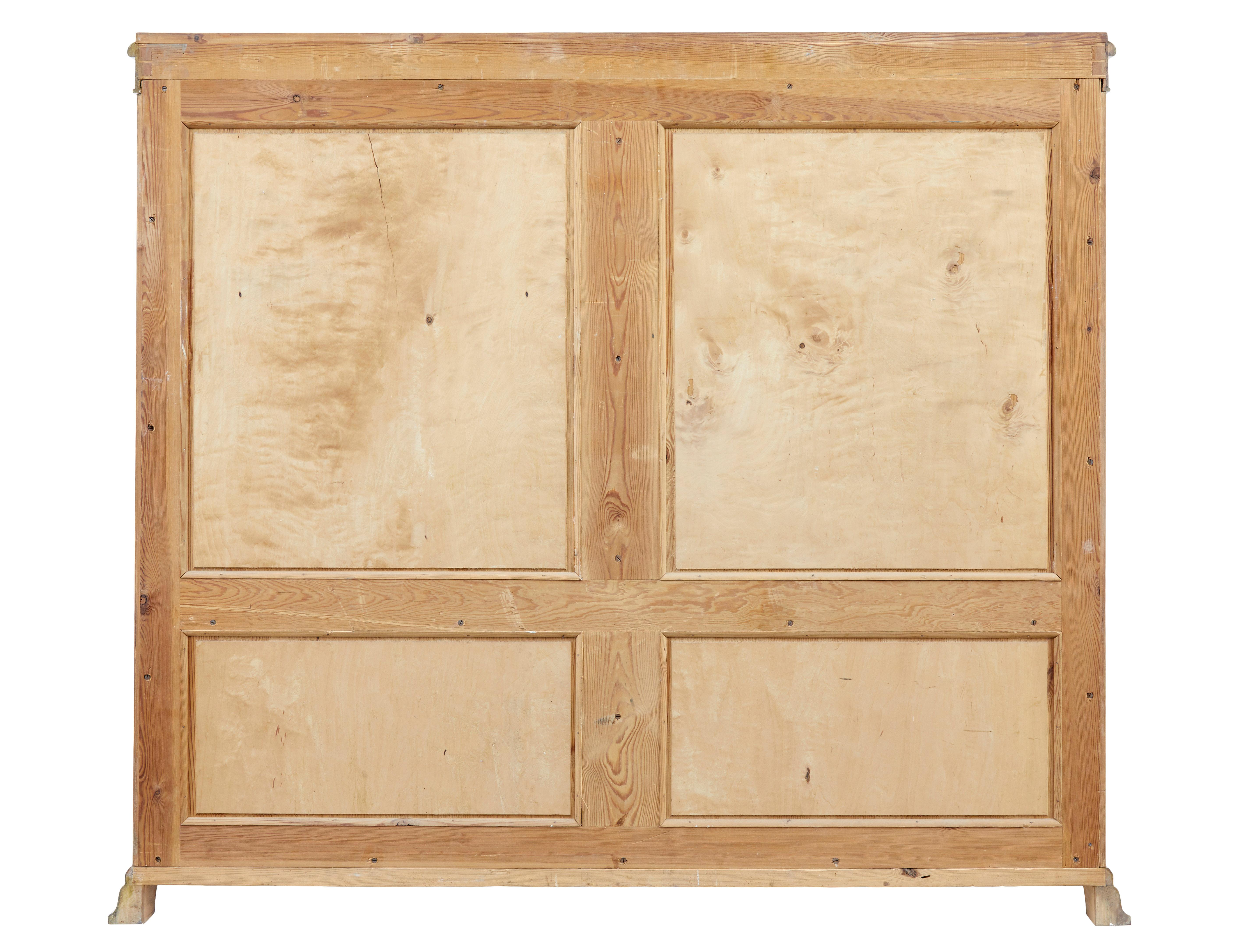 Early 20th century empire revival birch bookcase cabinet In Good Condition For Sale In Debenham, Suffolk