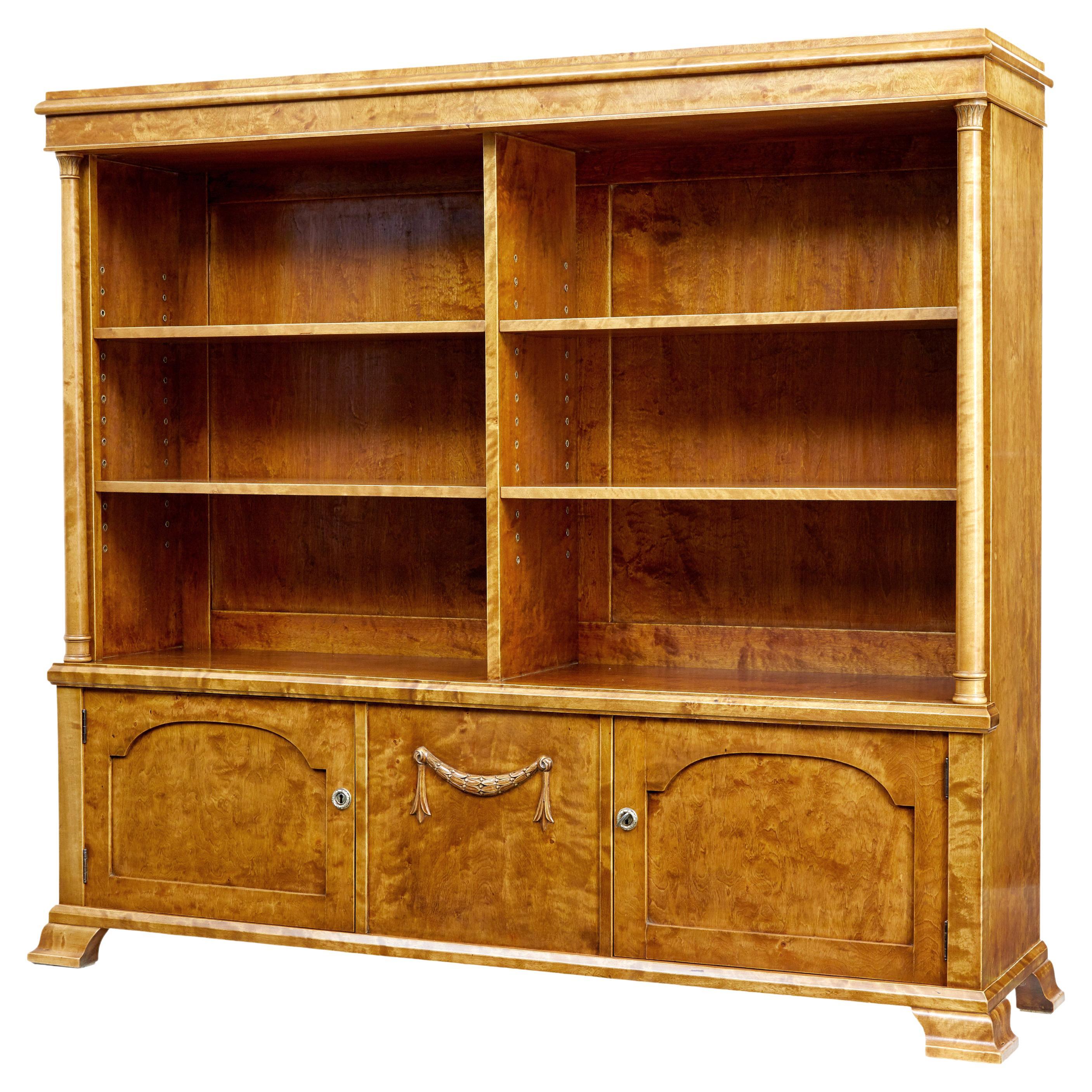 Early 20th century empire revival birch bookcase cabinet For Sale