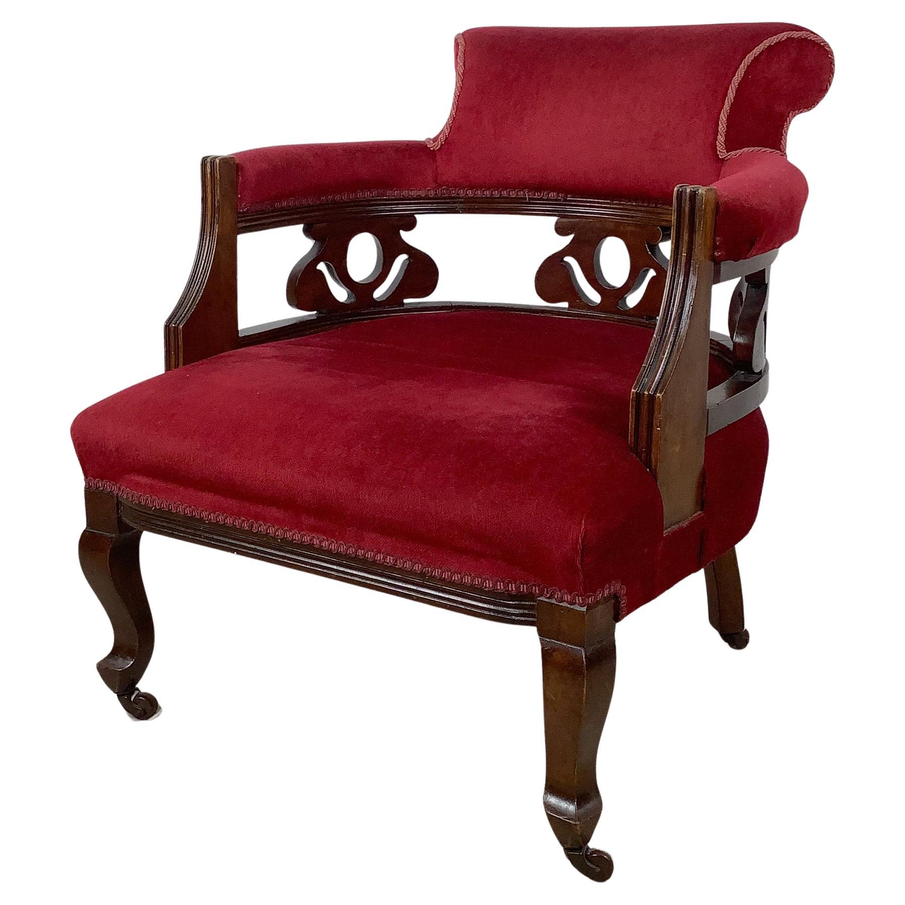 Early 20th Century Empire Revival Upholstered Library Armchair For Sale