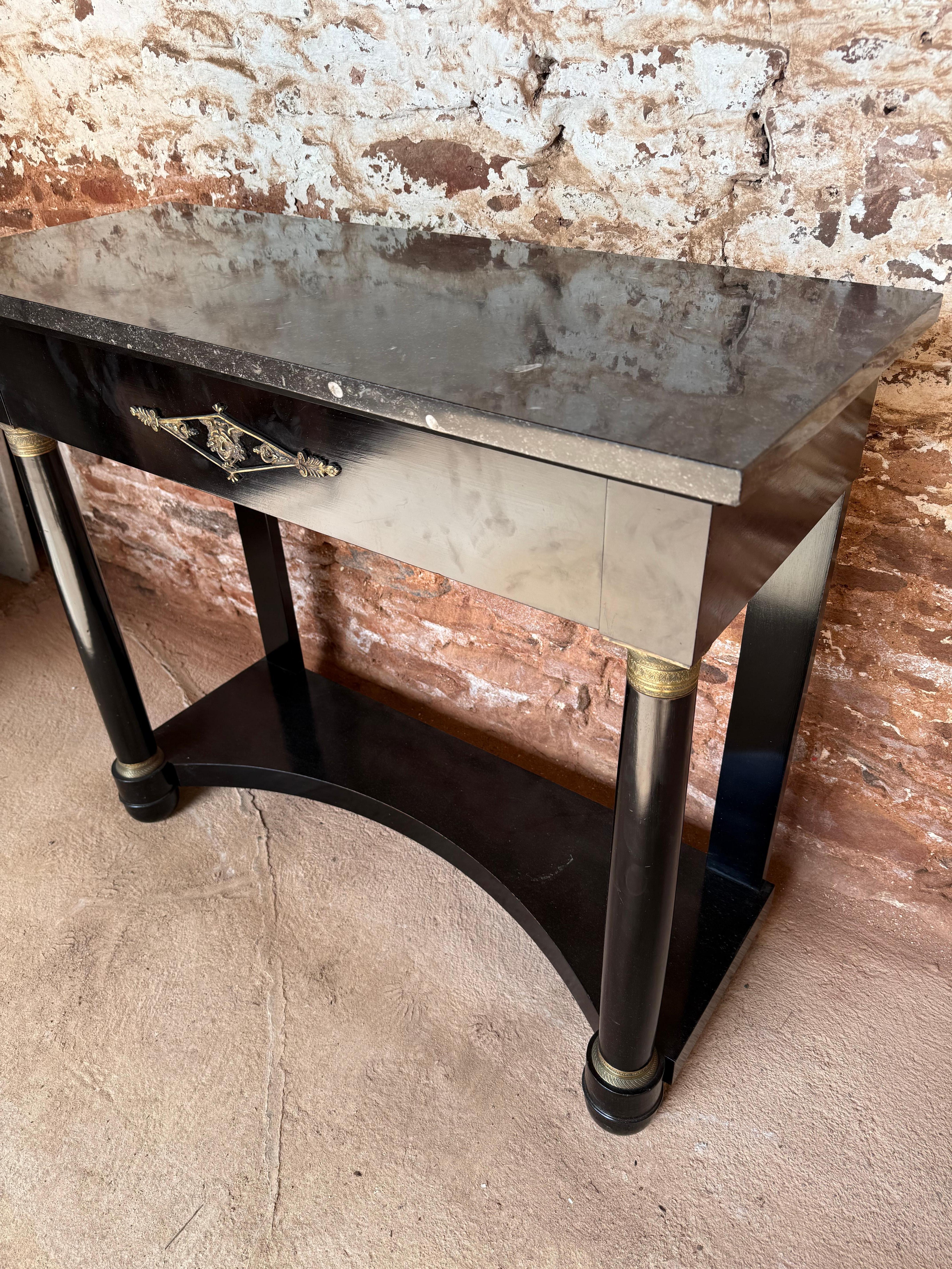 Empire Early 20th century empire style ebonised console table For Sale