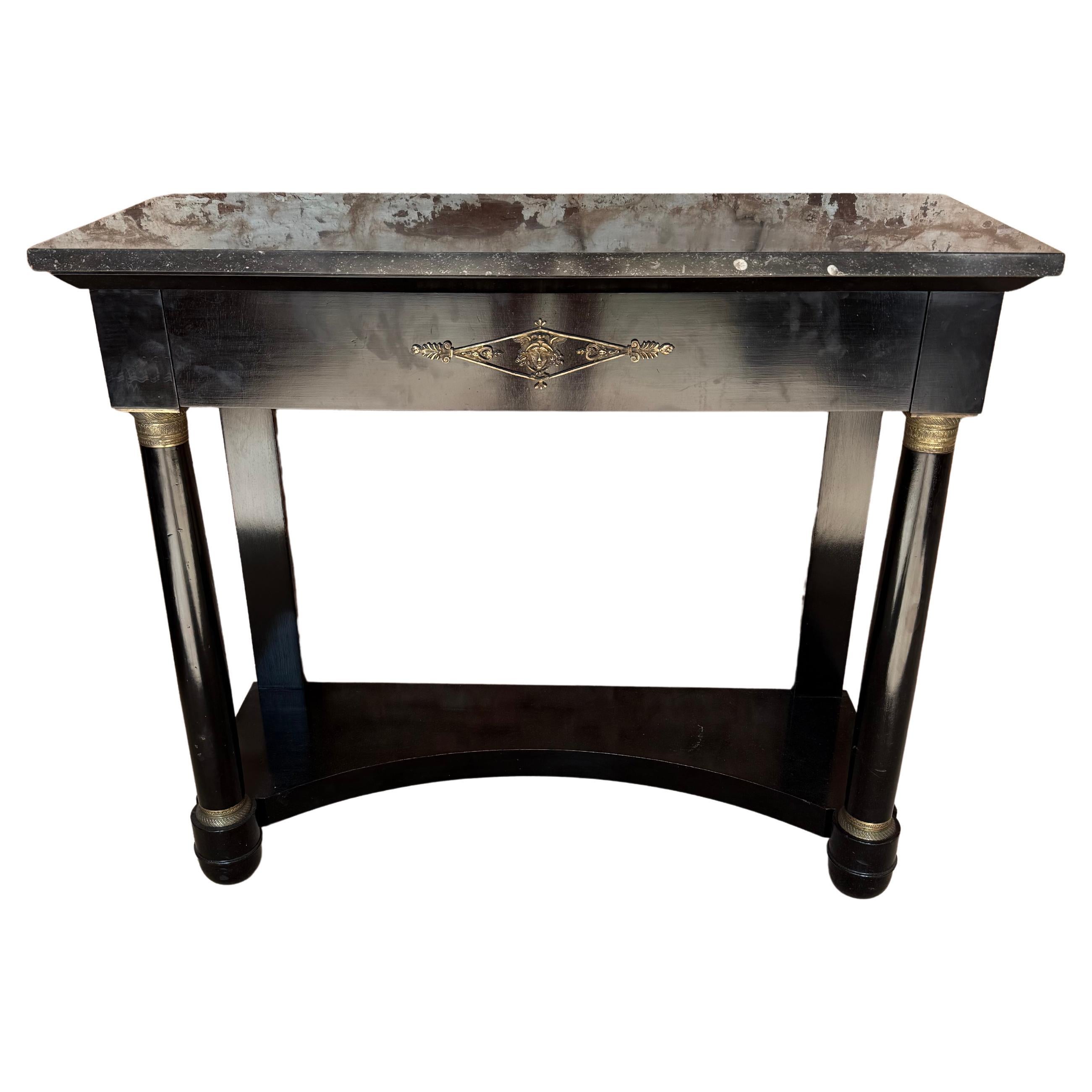 Early 20th century empire style ebonised console table