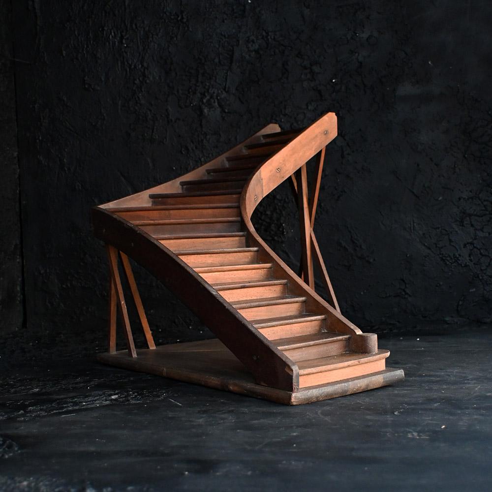 Early 20th century English Architectural Staircase Model

Hand crafted from sectioned pieces of carved wood, this early 20th century architectural model staircase shows elegant form with a natural deep patination. Held together with dovetail joints,