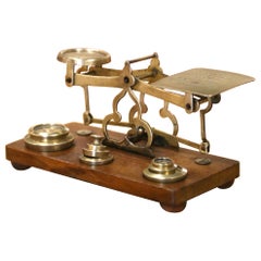 Early 20th Century English Brass Postal Scale with Weights on Oak Base