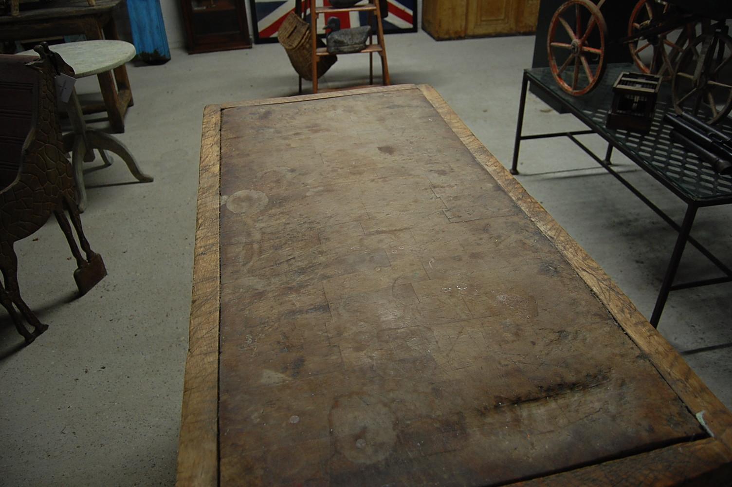 Large double English butchers block, as expected age, wear and patination, original stand, England, circa 1900.