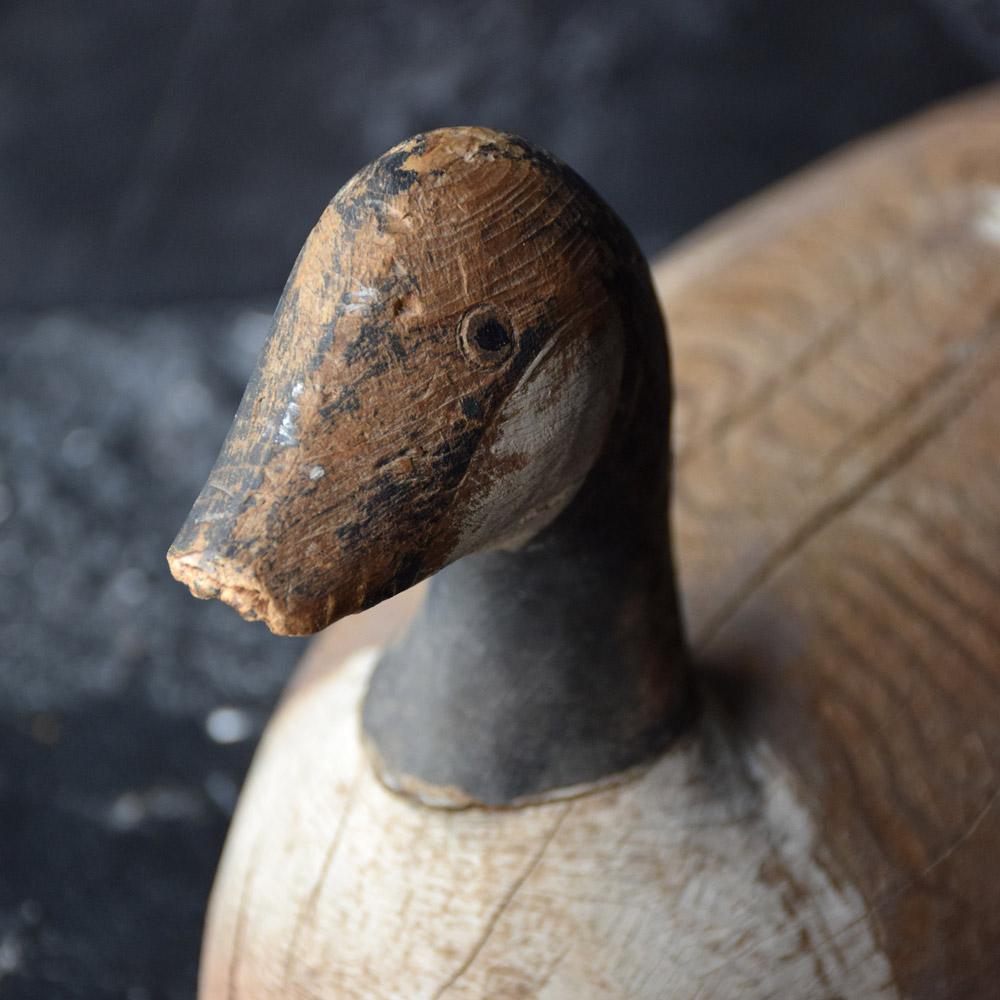 Early 20th century carved decoy goose
We are proud to offer a highly decorative and authentic working example of a carved wooden early 20th Century English decoy goose. Exceptionally made from sectioned wood and hand painted detail, this example