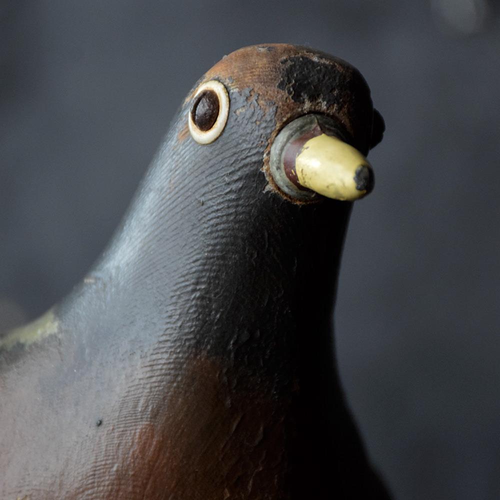 Early 20th century English carved decoy pigeon

We share what we love, and we love this early 20th century example of a hand-crafted English decoy pigeon. With its original mounting bracket still in place, naively crafted using found objects for