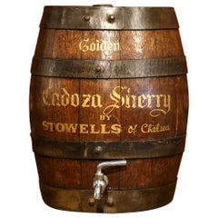 Used Early 20th Century English Carved Oak and Metal Cream Sherry Barrel