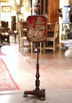 Early 20th Century English Carved Walnut Needlepoint Fire Screen with Deer