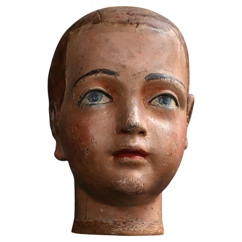 Early 20th century English carved wooden shop mannequin head