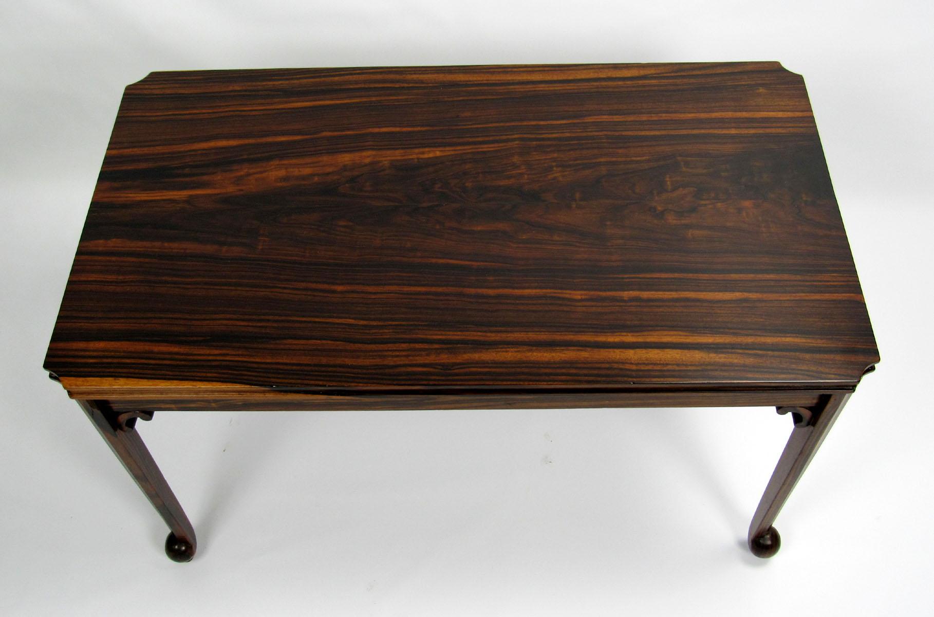Early 20th century cocktail table from England made from exotic woods, purchased from JF Chen.