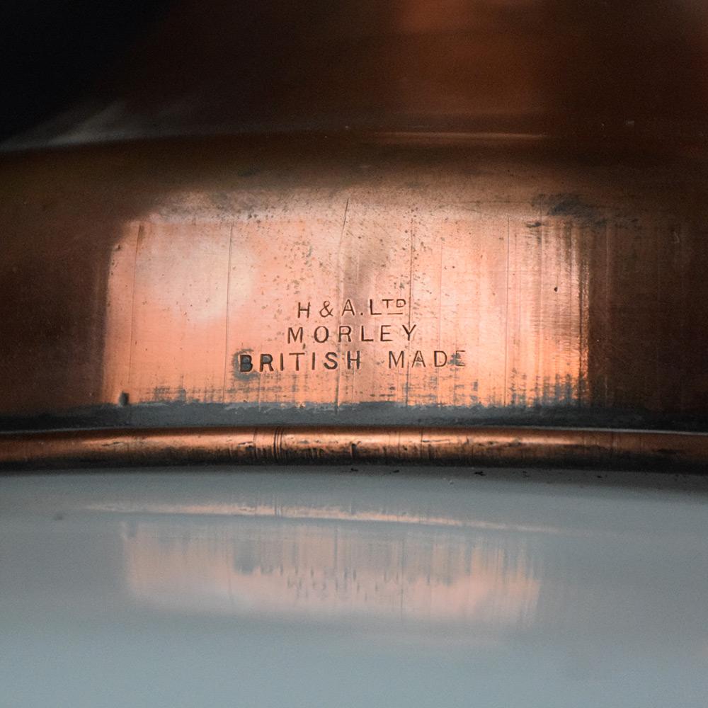 Early 20th century English copper light shade 

A large, stamped hallmark British glass shade with its original copper hinged gallery also stamped H & A Ltd Morley British Made. A completely original example, with and unusual screw top hinged open