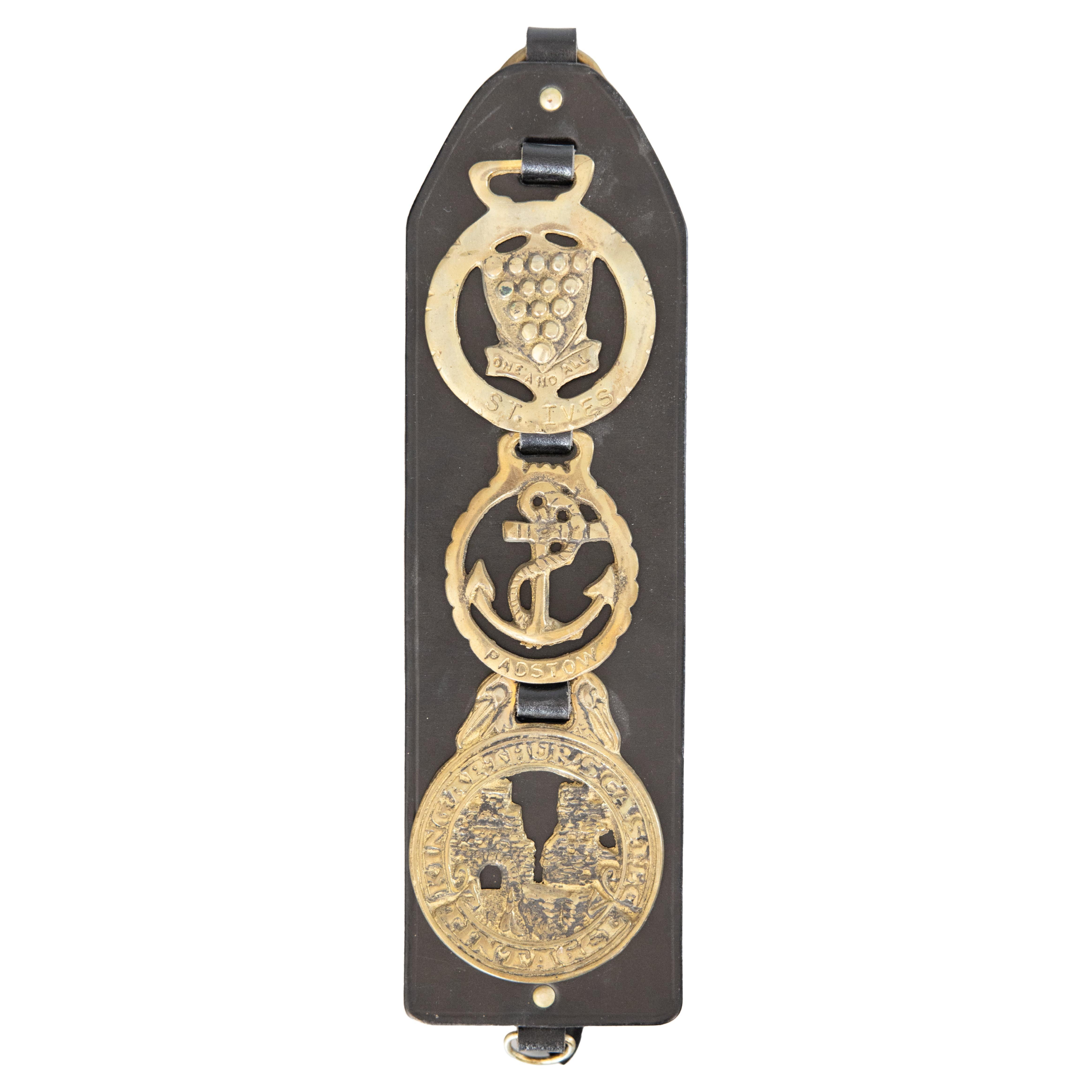 Early 20th Century English Equestrian Leather Strap With 3 Horse Brasses For Sale