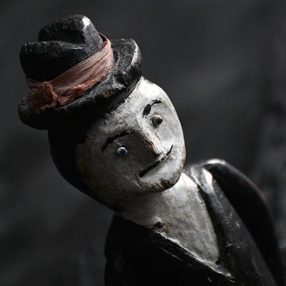 Early 20th Century English Folk Art Jigger Doll with Beaded Eyes

A great example of an early 20th century English hand carved folk art articulated jigger doll. With charming hand carved boots, metal pins in its joints for articulation purposes. All