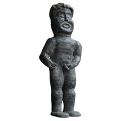Early 20th century English folk art lead pissing boy figure